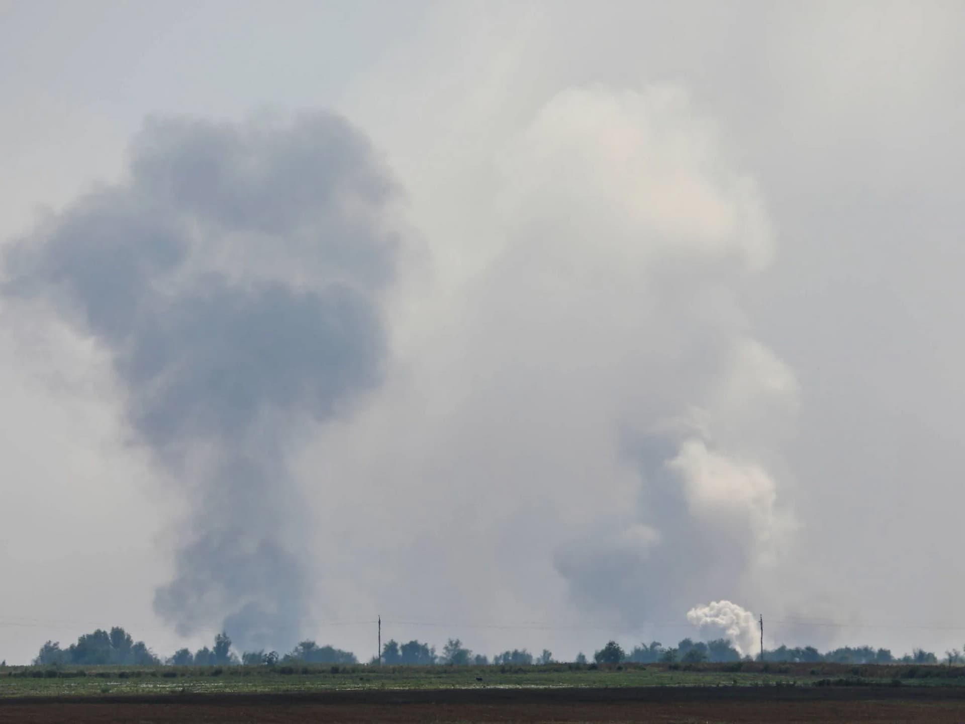 Smoke rises following an explosion in the village of Mayskoye in the Dzhankoi district of Crimea