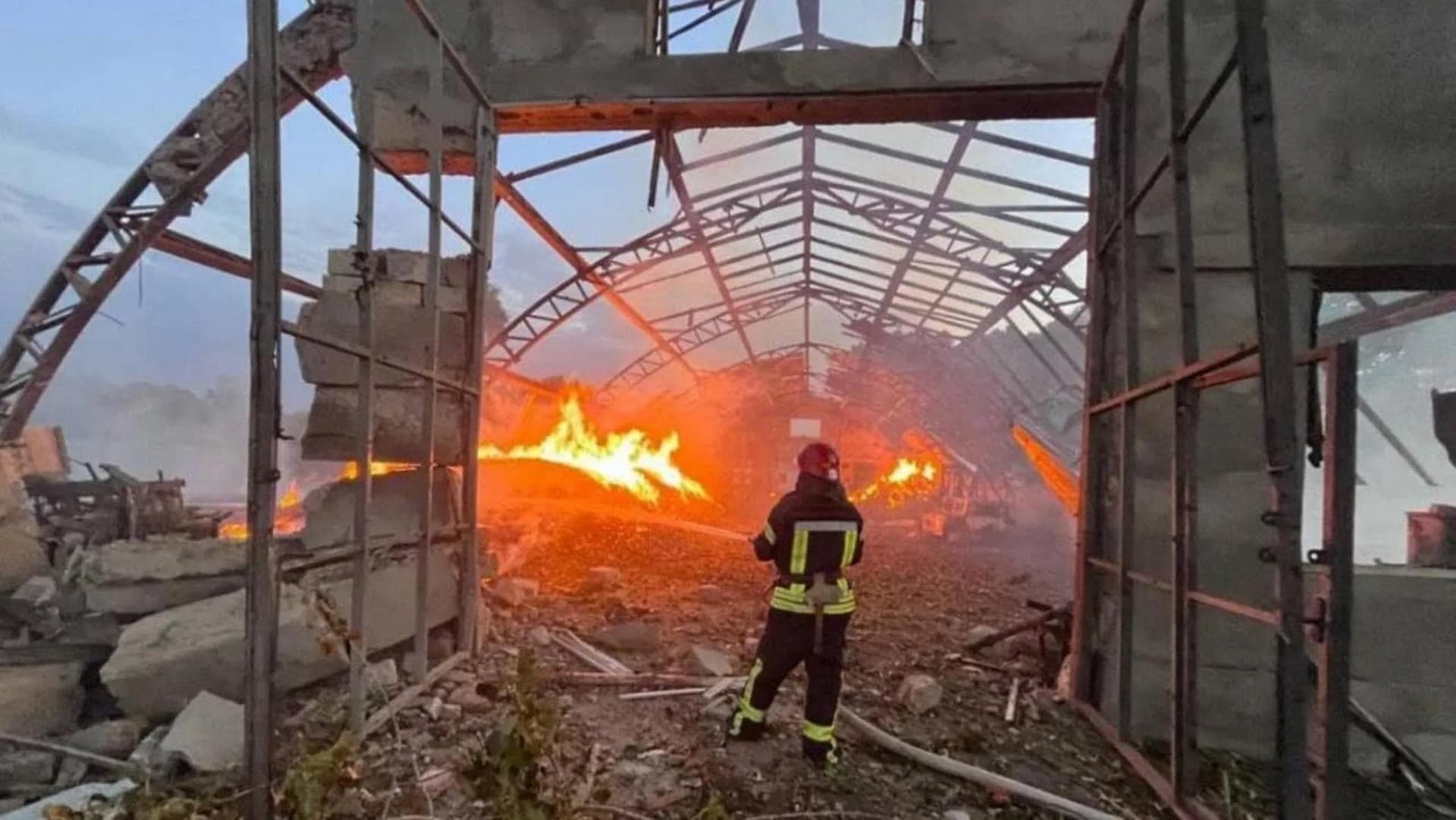 A firefighter works at a site that was hit amid Russian drone attacks in Ukraine's Odesa region