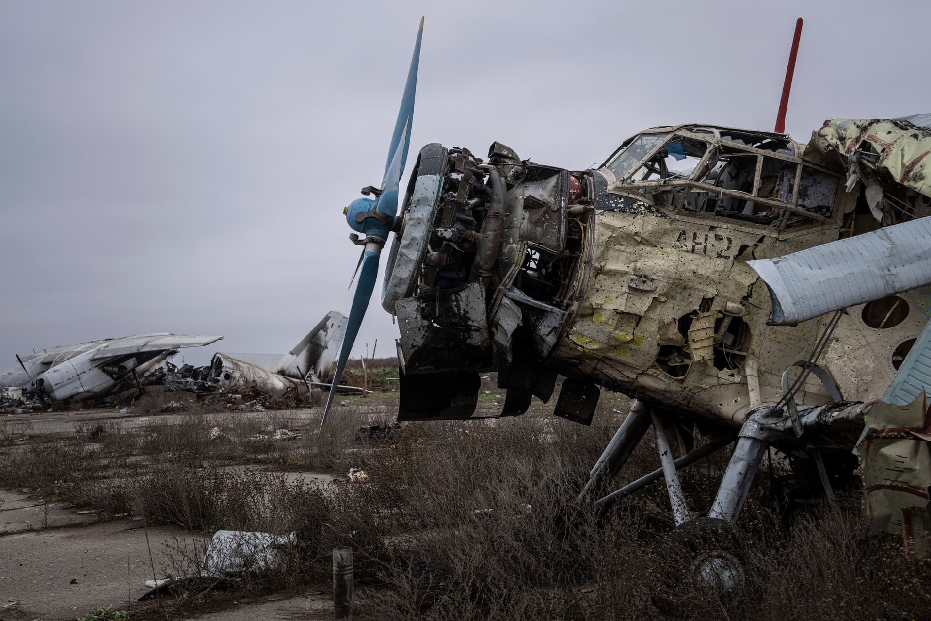 An aircraft that was destroyed during fighting between Ukrainian and Russian forces is seen at the Kherson international airport in Kherson