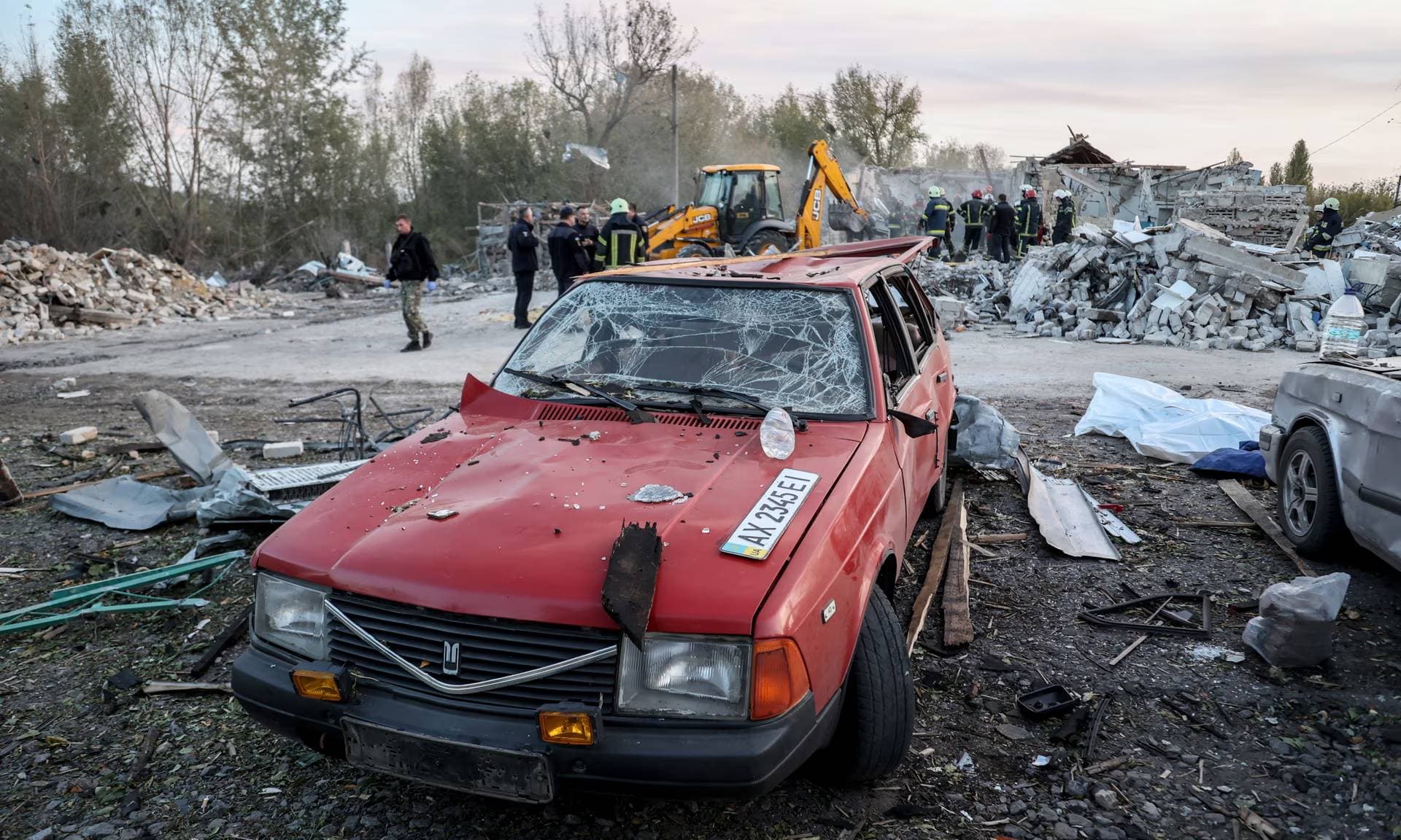 At least 51 people were killed after a rocket struck a cafe in a village in Ukraine's Kharkiv region during a wake service