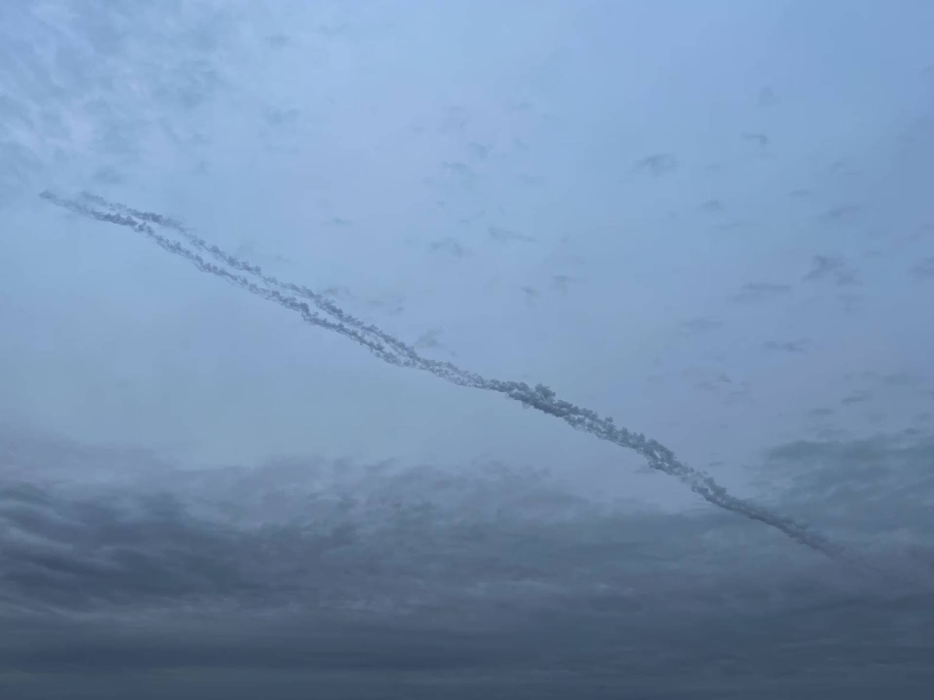 Missile traces in the sky over the city after a Russian missile strike in Kyiv