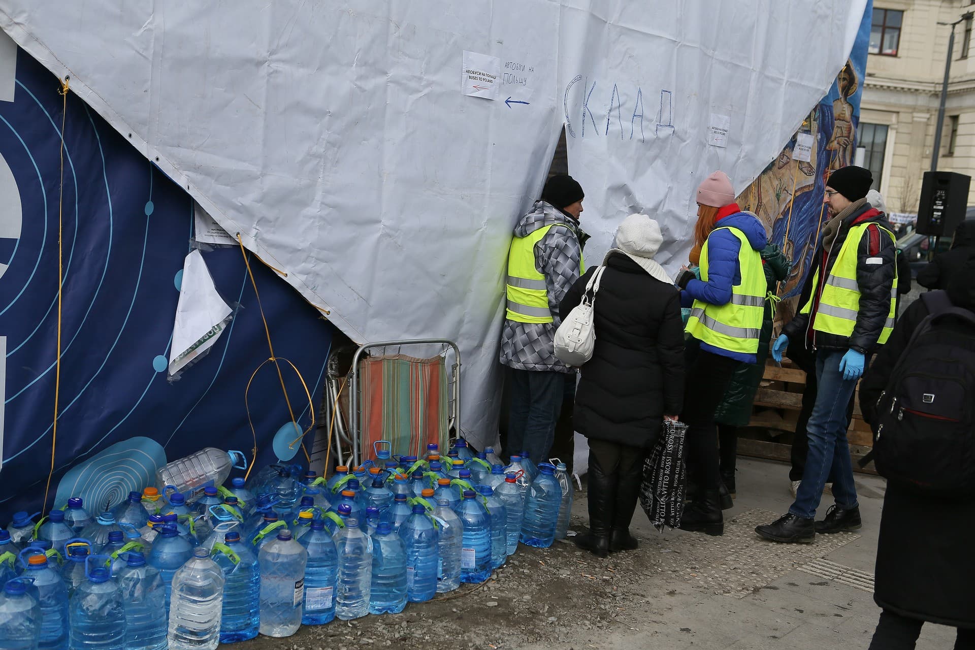 Volunteers work on the territory of the refugee center in Lviv