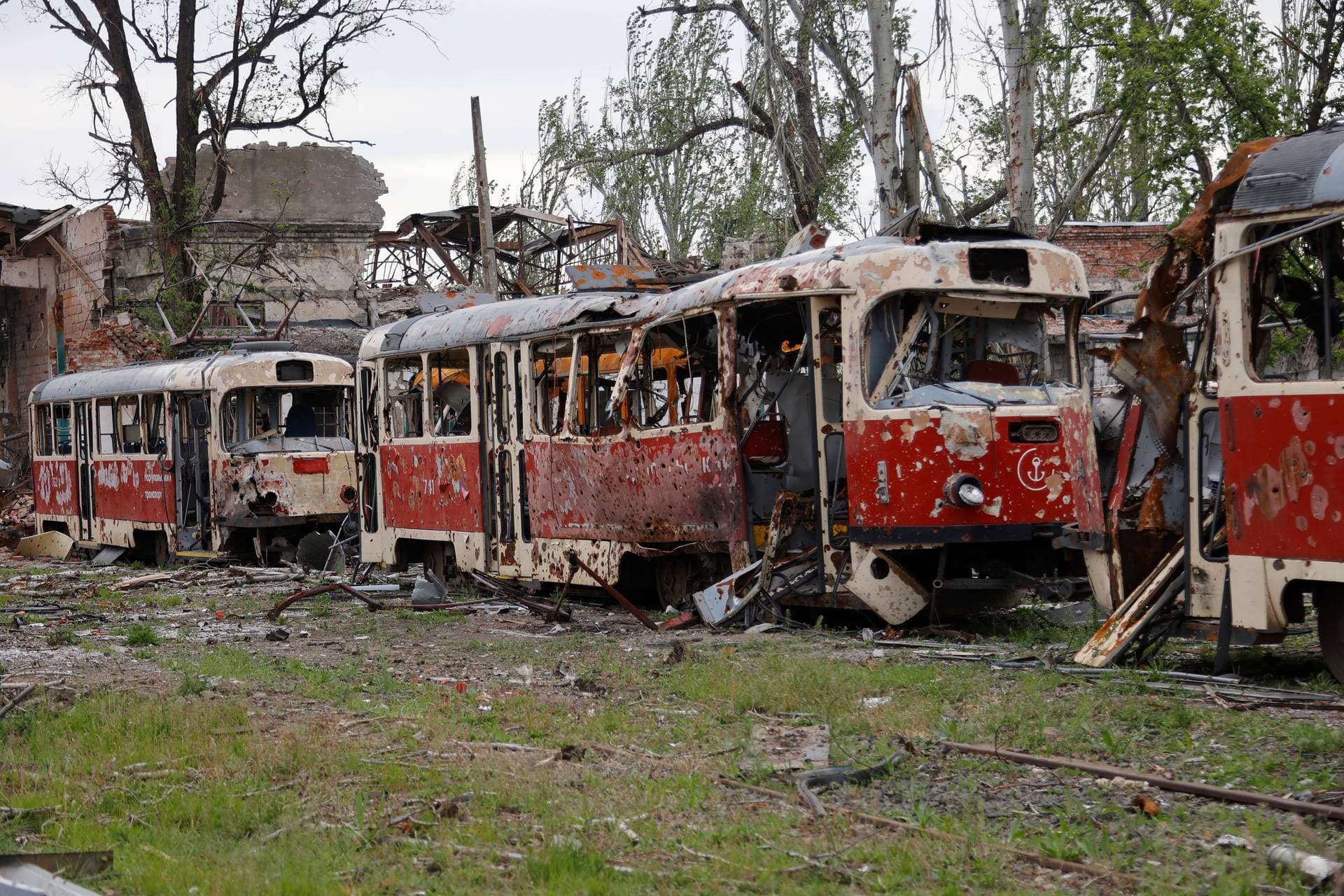 Destroyed trams stand in a depot in Mariupol