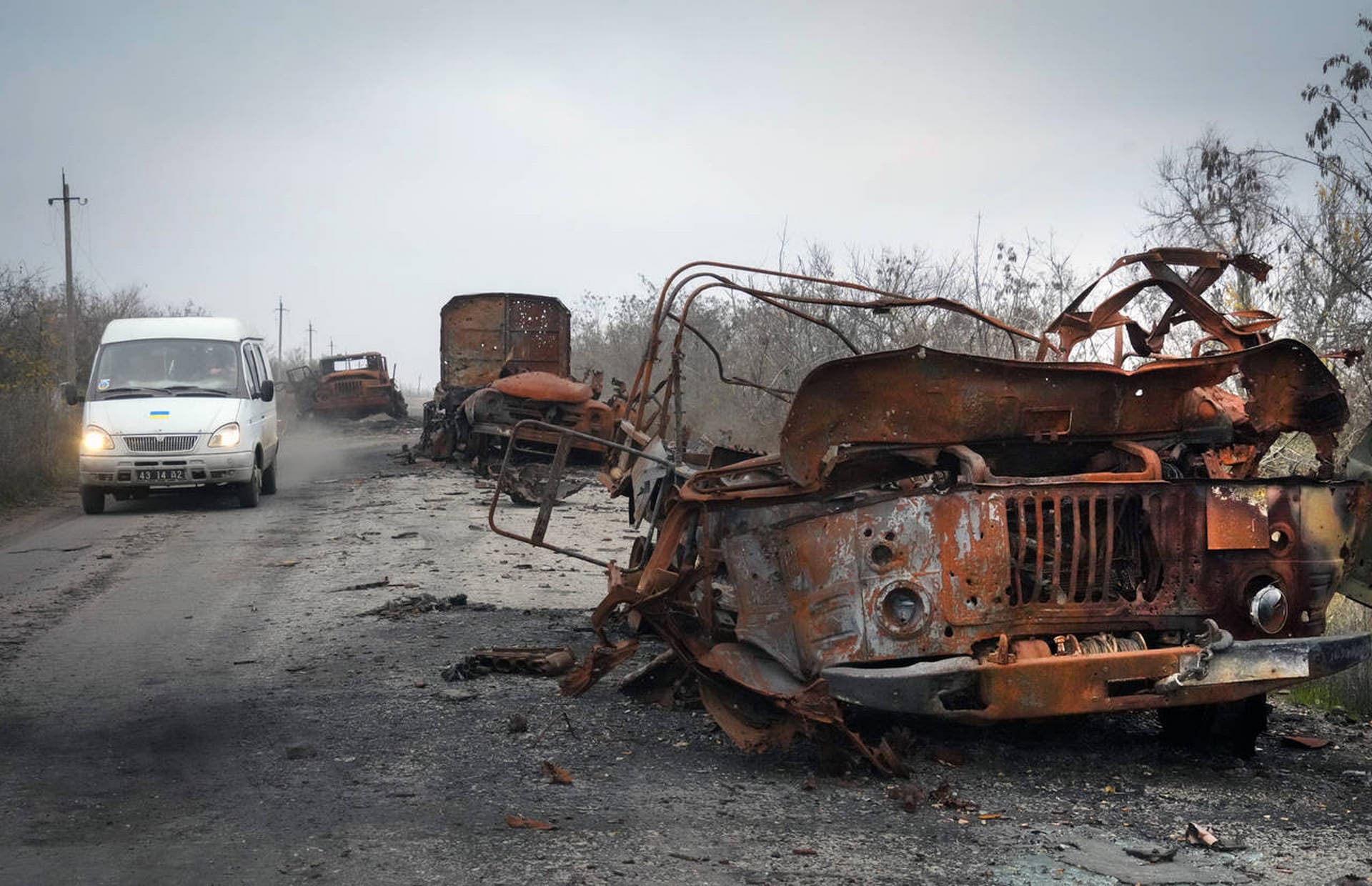 Burnt military cars are seen on the road after heavy battles between Ukrainian troops and Russian invaders in Mykolaiv region, Ukraine