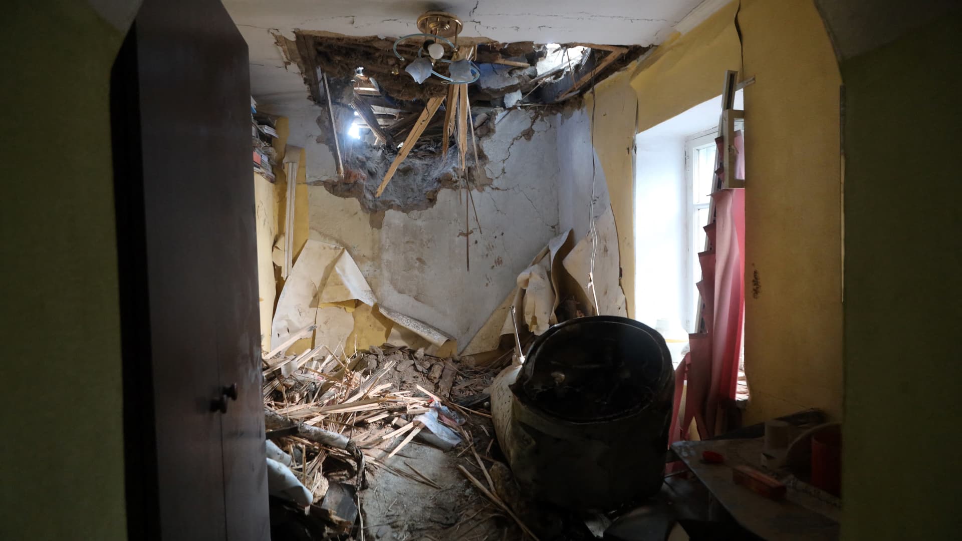 A downed missile hit a private house after overnight missile strikes on Odesa