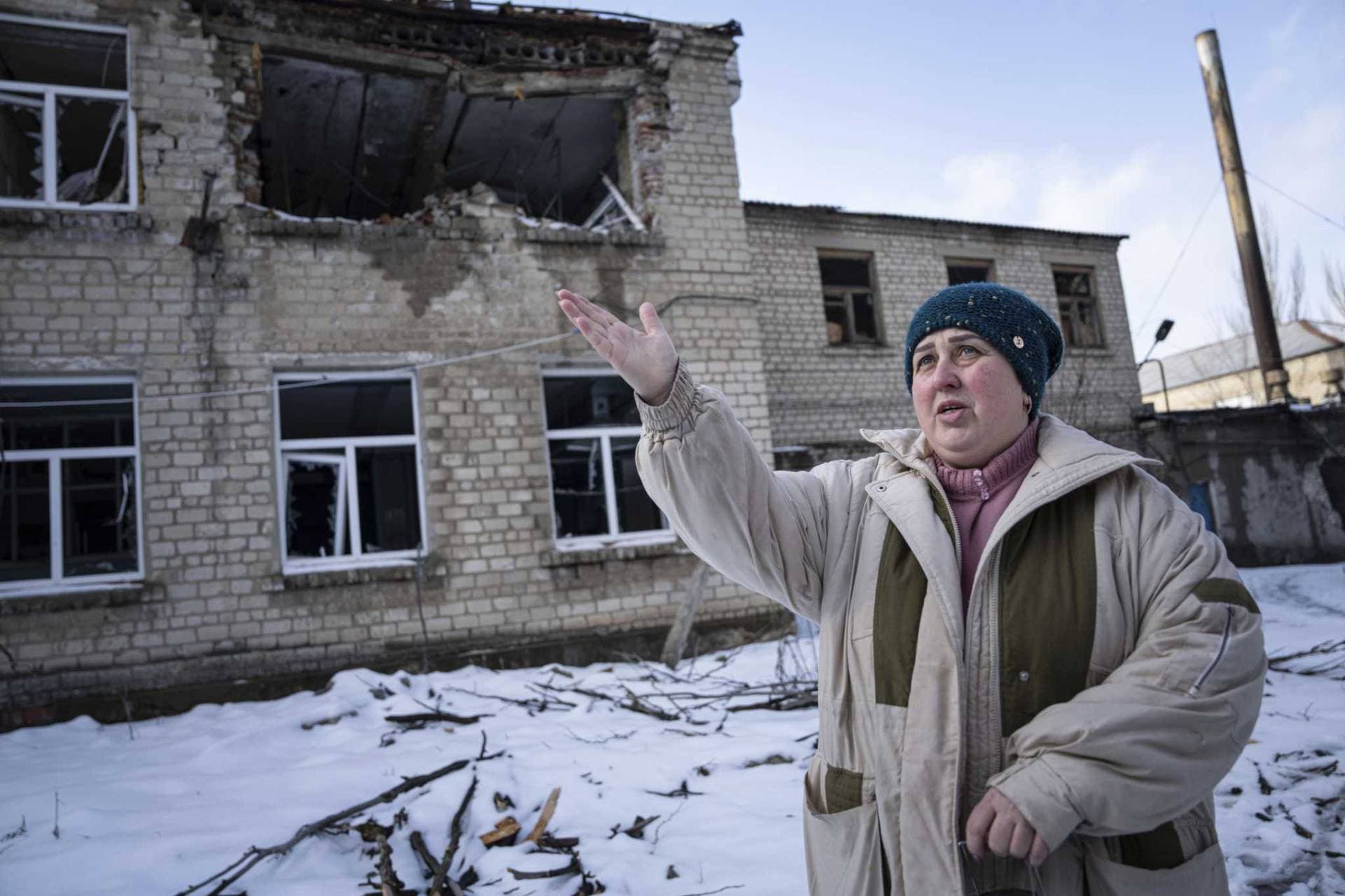 Valentyna Mozgova,  lab medic gestures as she talks at a hospital which was damaged by Russian shelling in Krasnohorivka, Ukraine, Sunday, Feb. 19, 2023.