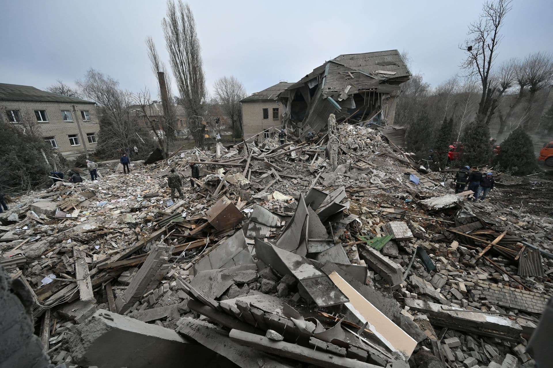 Rescuers work at the site of a maternity ward of a hospital destroyed by a Russian missile attack in Vilniansk