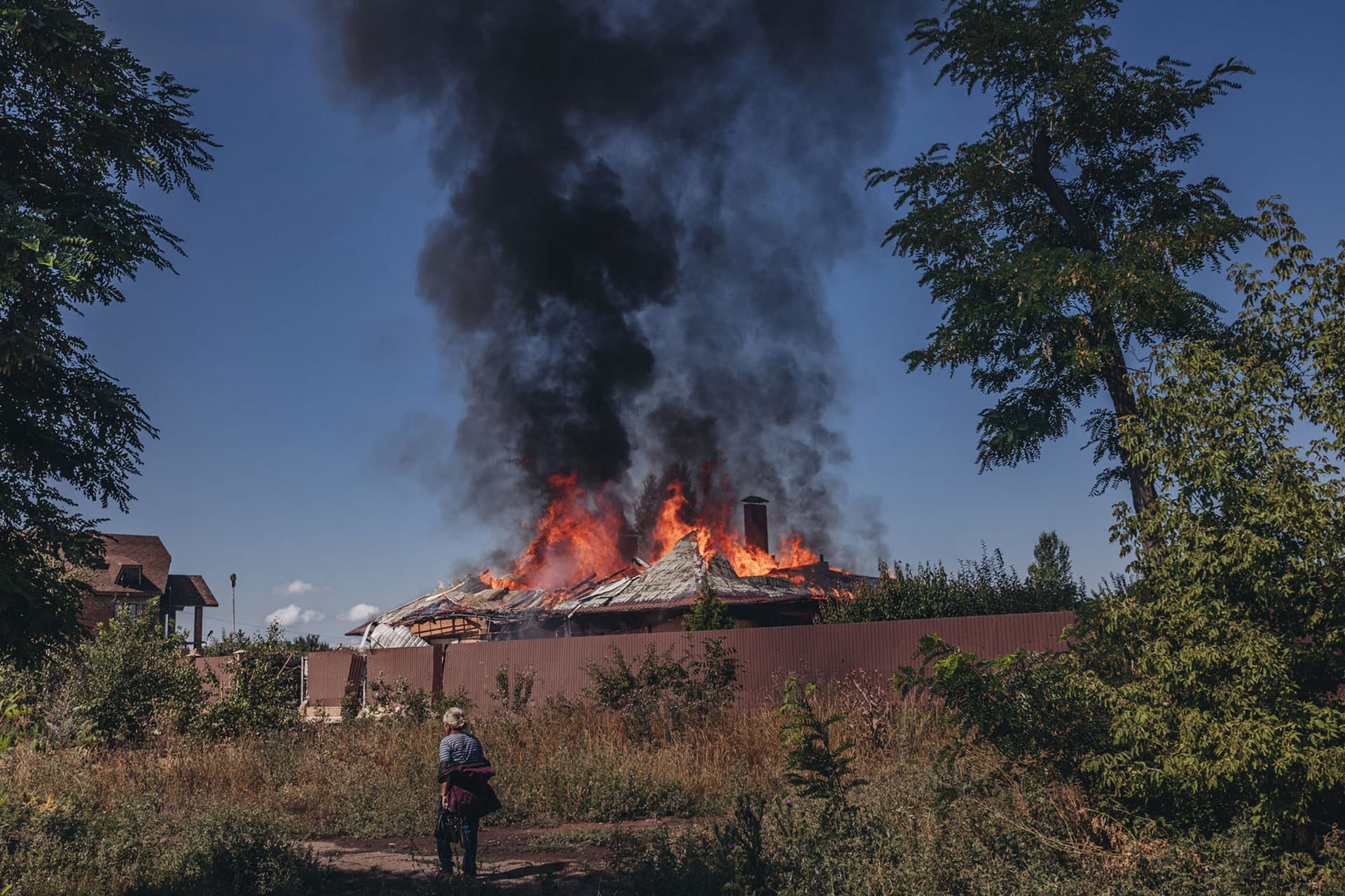 A house burns after a Russian bombing in Bakhmut