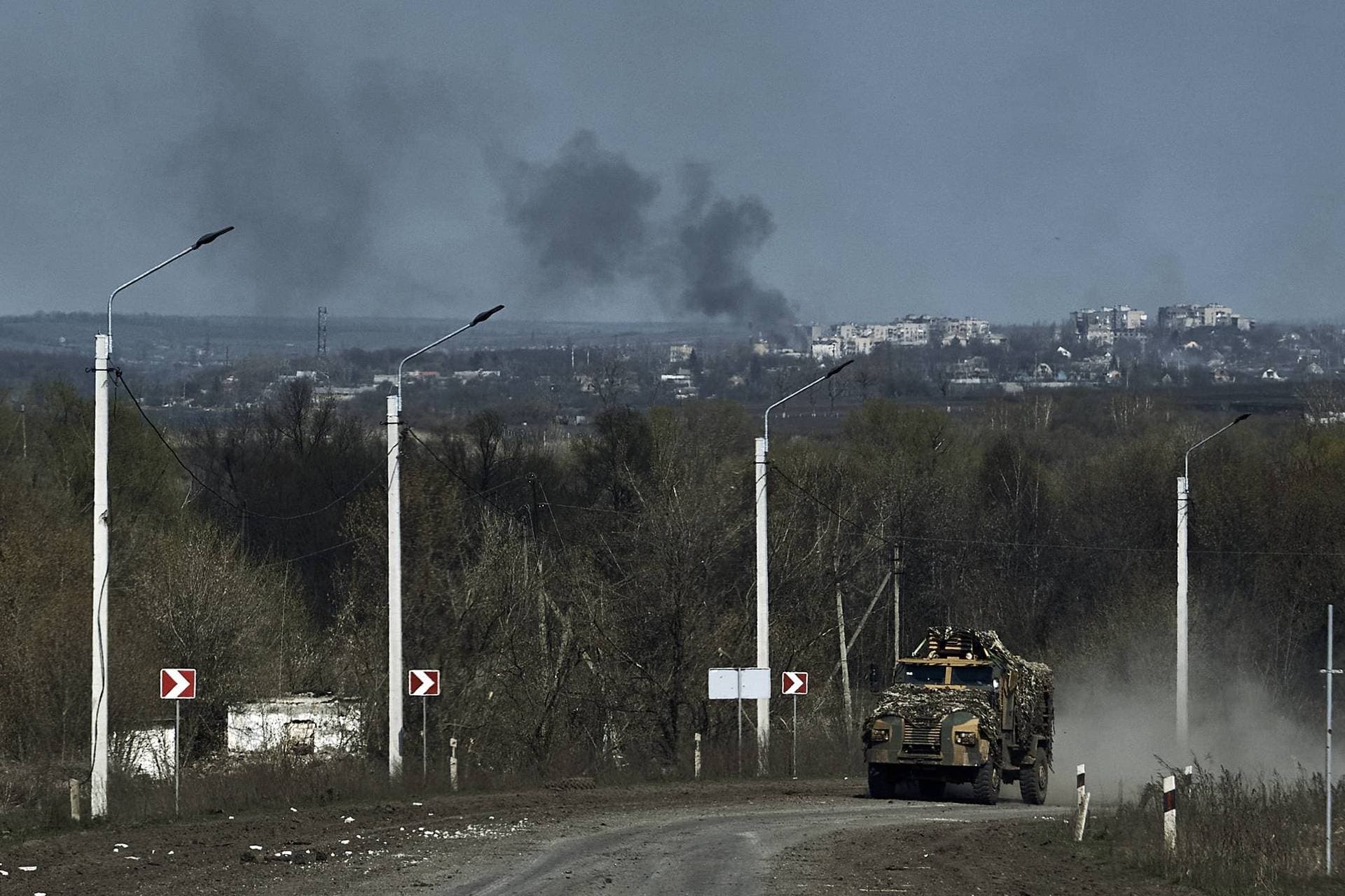 A Ukrainian APC seen on the road on the frontline in Bakhmut