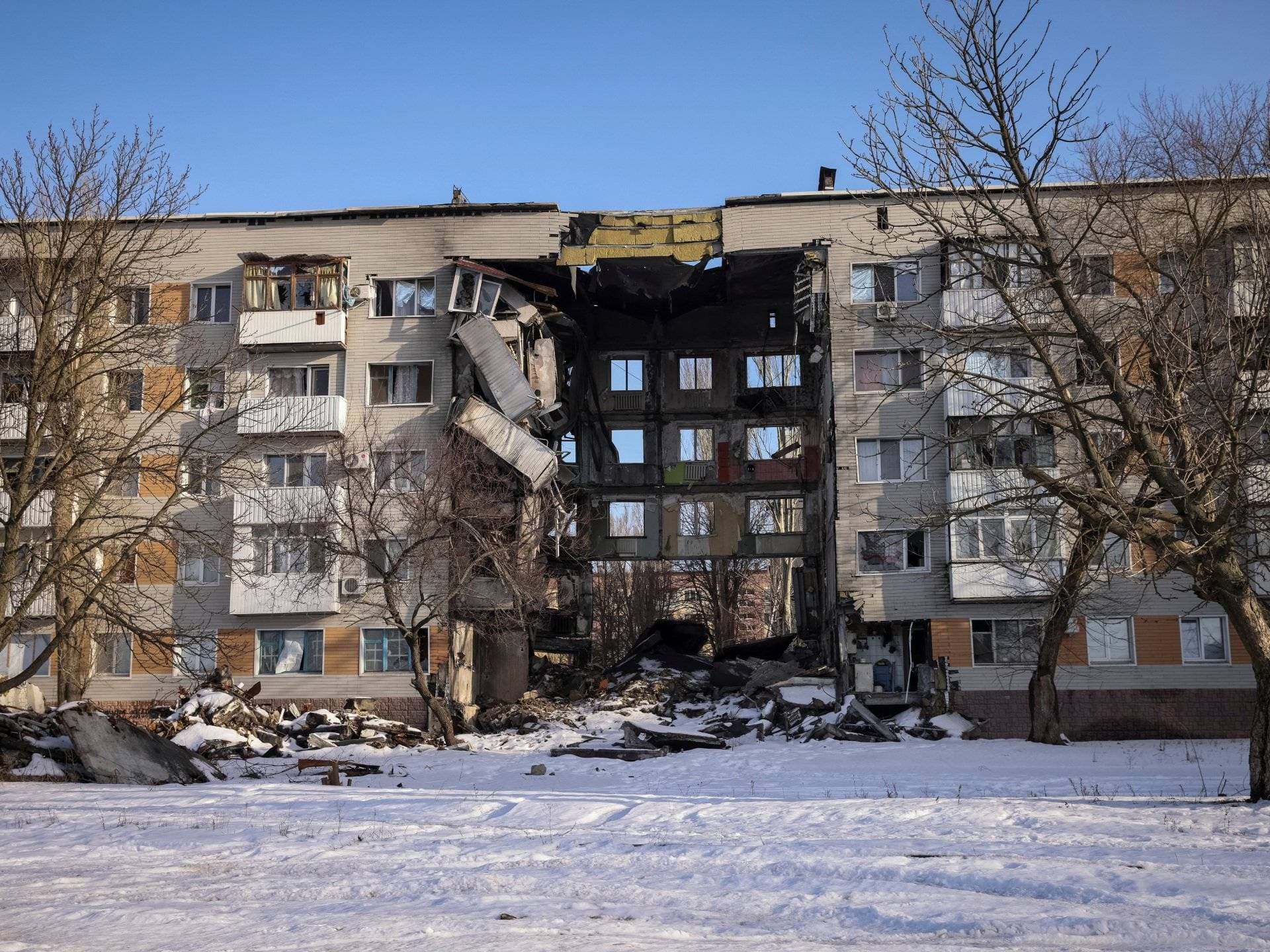 A general view shows an apartment building damaged by a Russian military attack, in the front-line city of Bakhmut