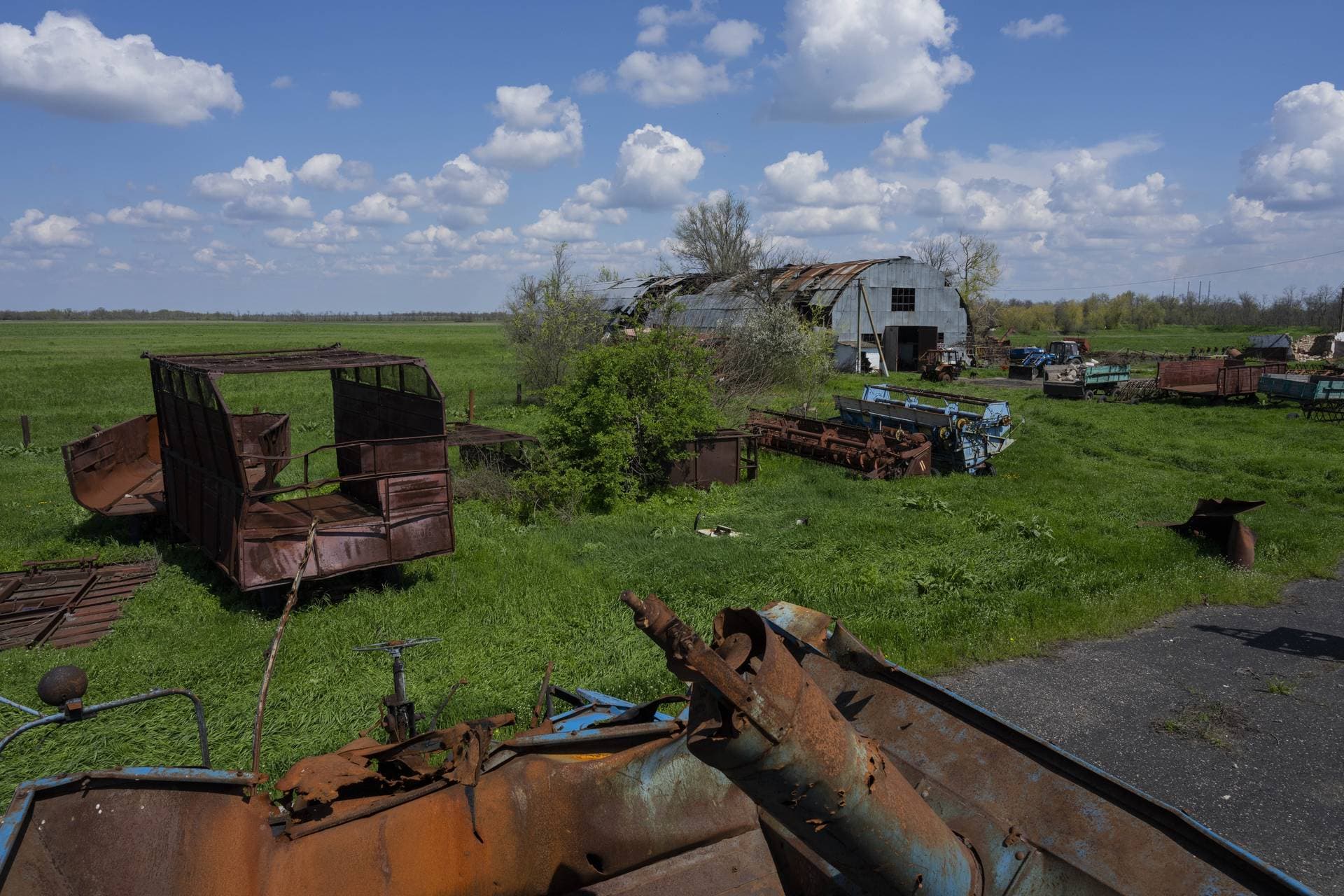 Destroyed farm machinery and warehouse in Potomkyne village