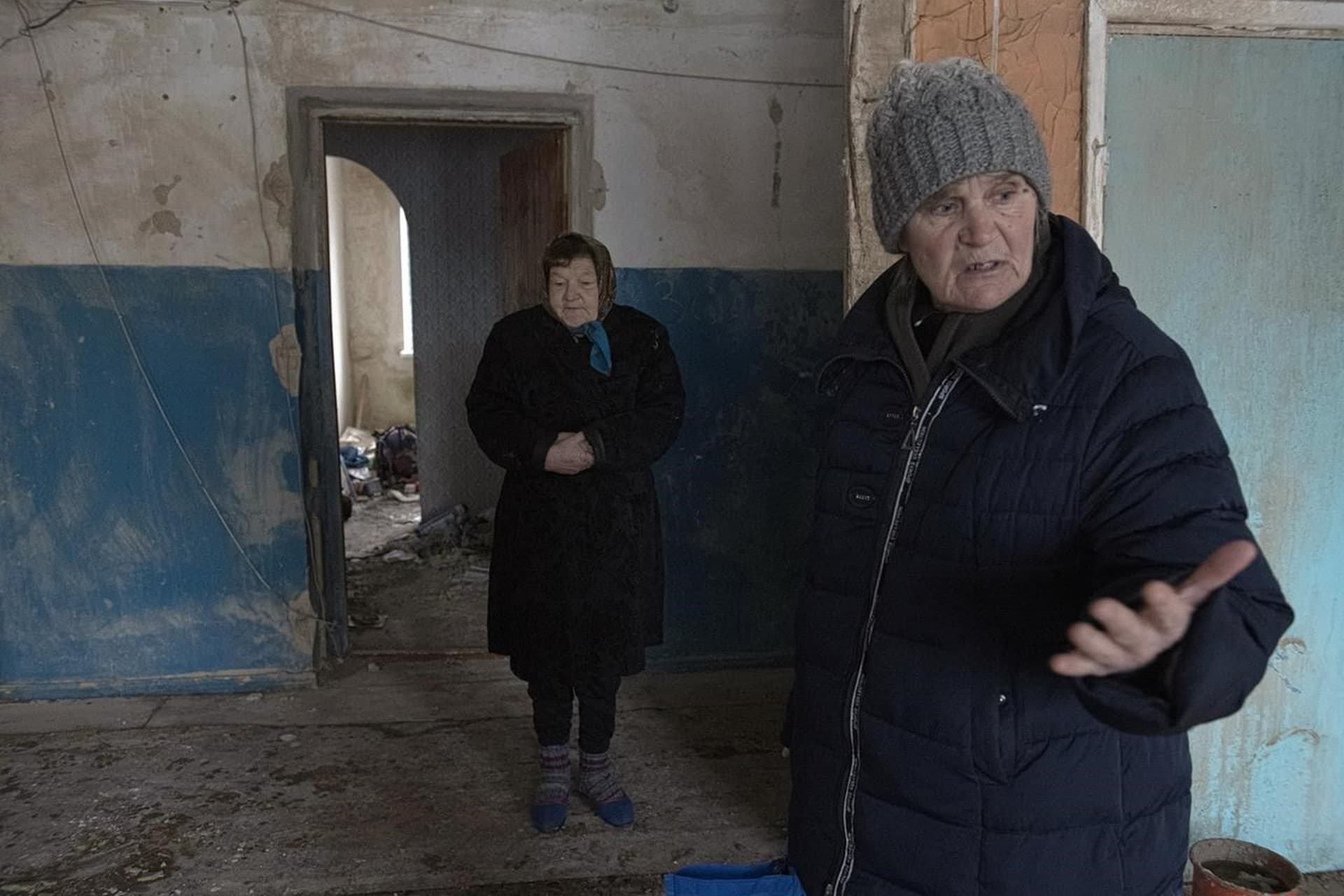 Hanna Reznikova and Zoya Pavliuk in bombed-out building in Borodyanka