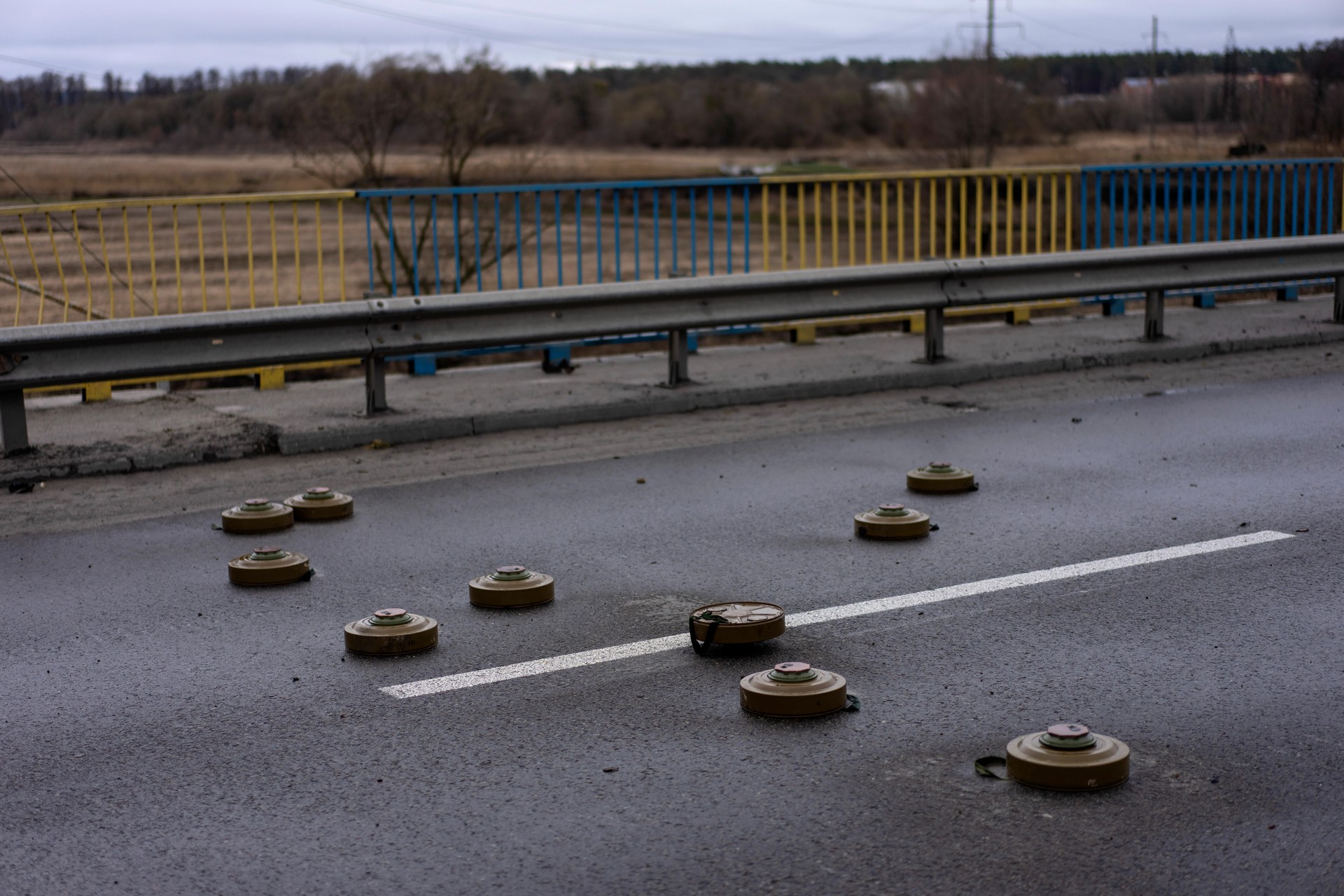 Anti-tank mines are spread out on a bridge in Bucha