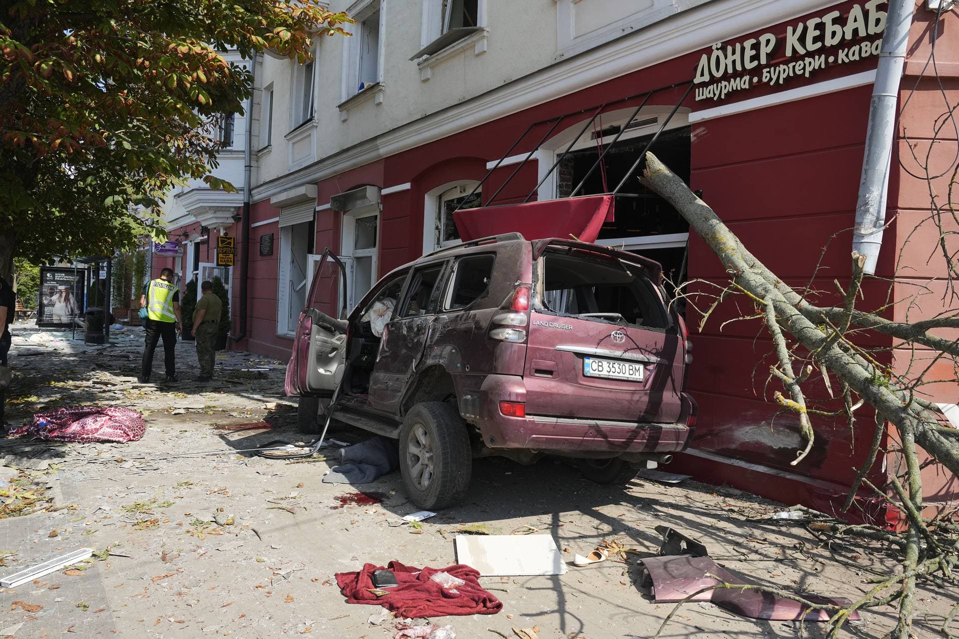 a car damaged by Russian attack in Chernihiv