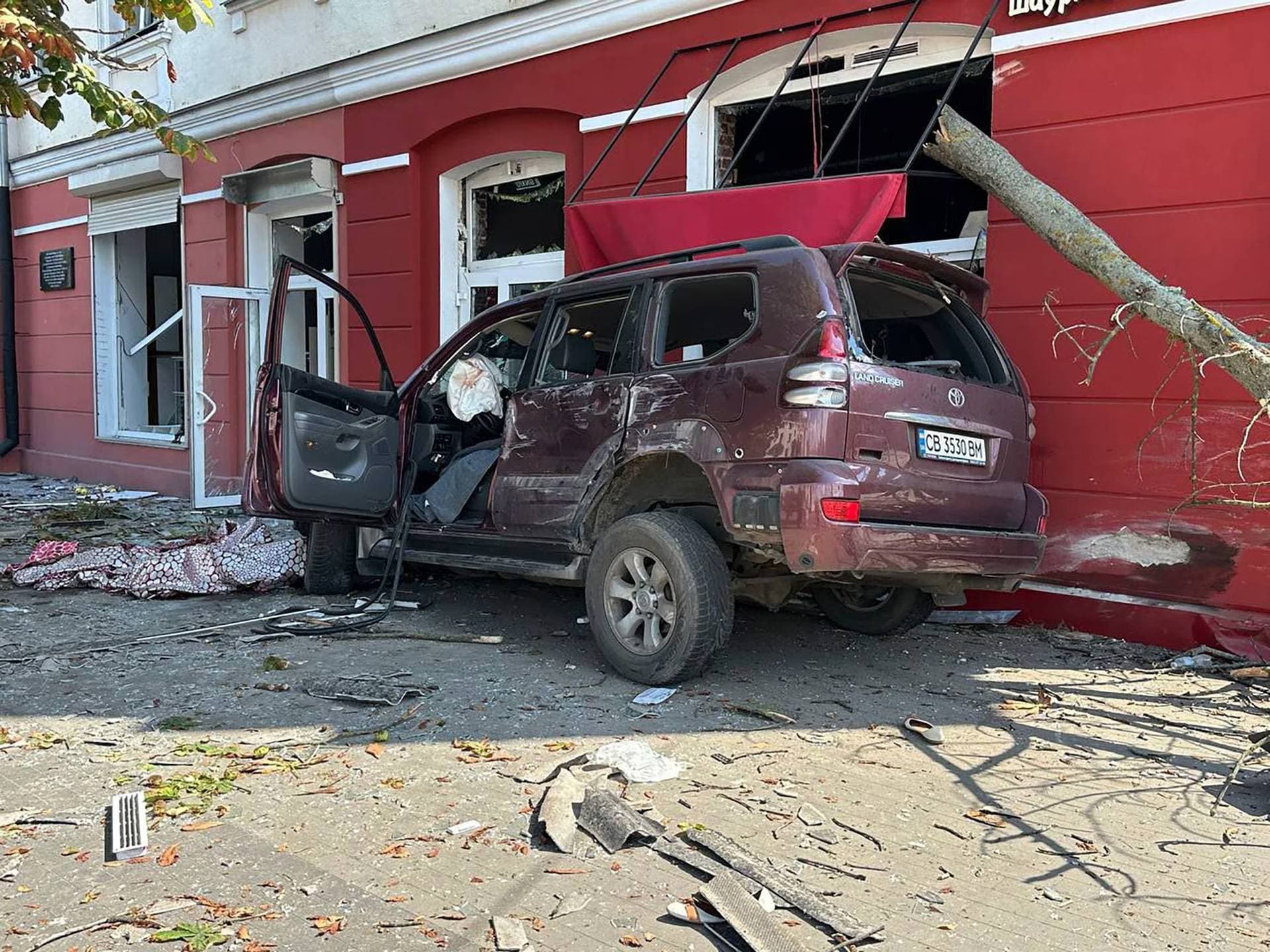 a car damaged by Russian attack in Chernihiv