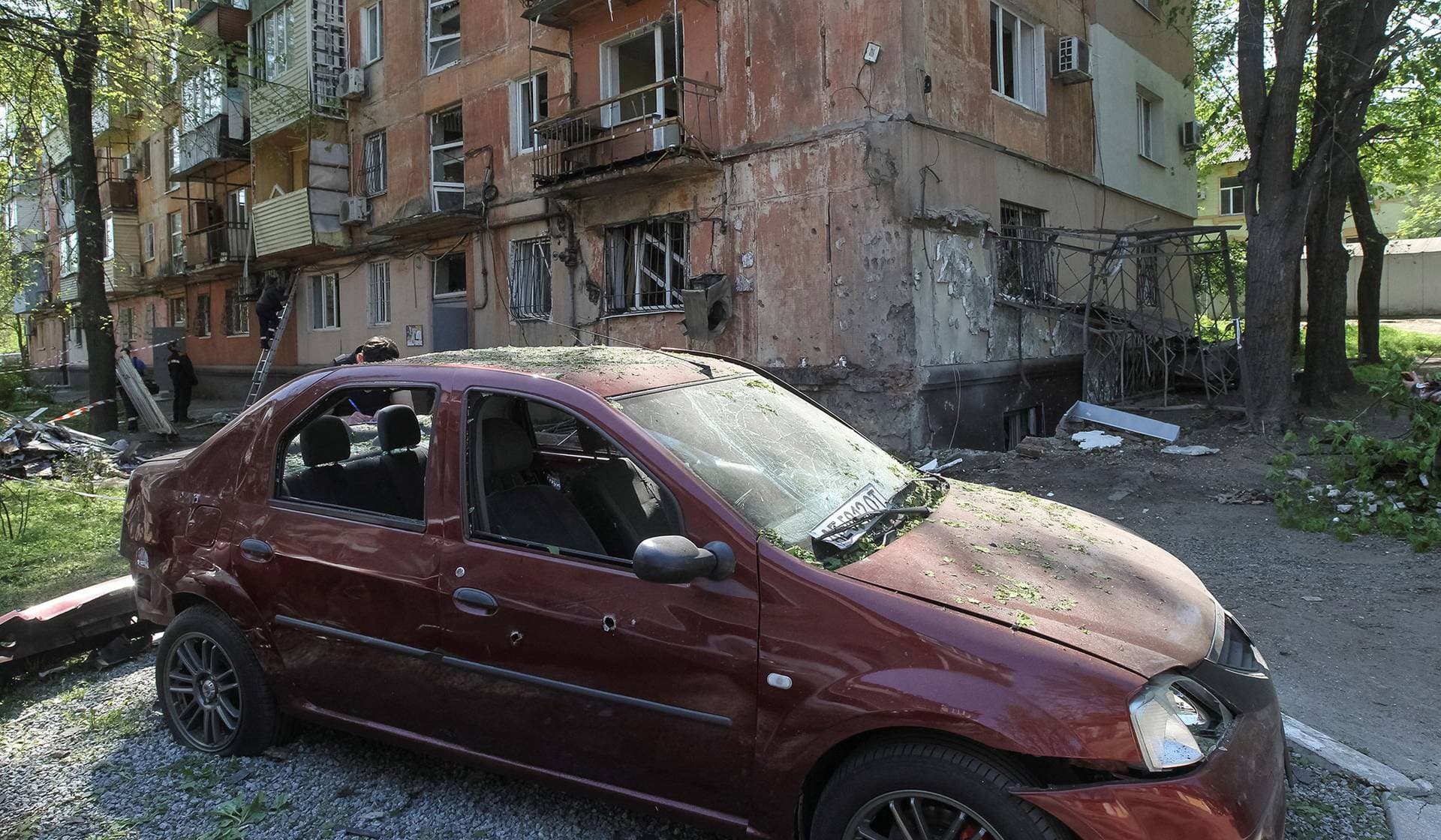 A site of an apartment building hit by a Russian drone strike in Dnipro