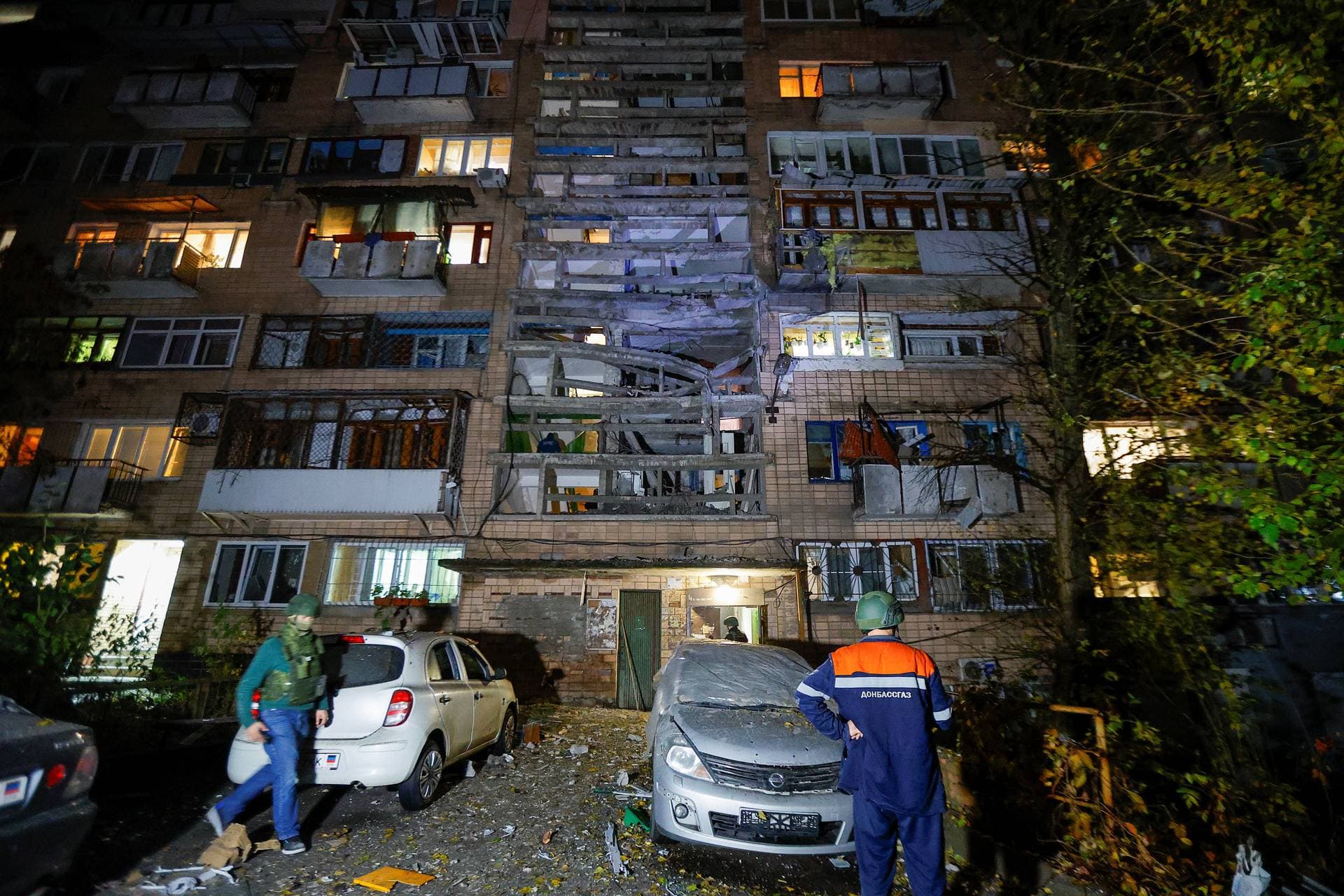 a multi-storey residential building damaged in recent shelling in Donetsk