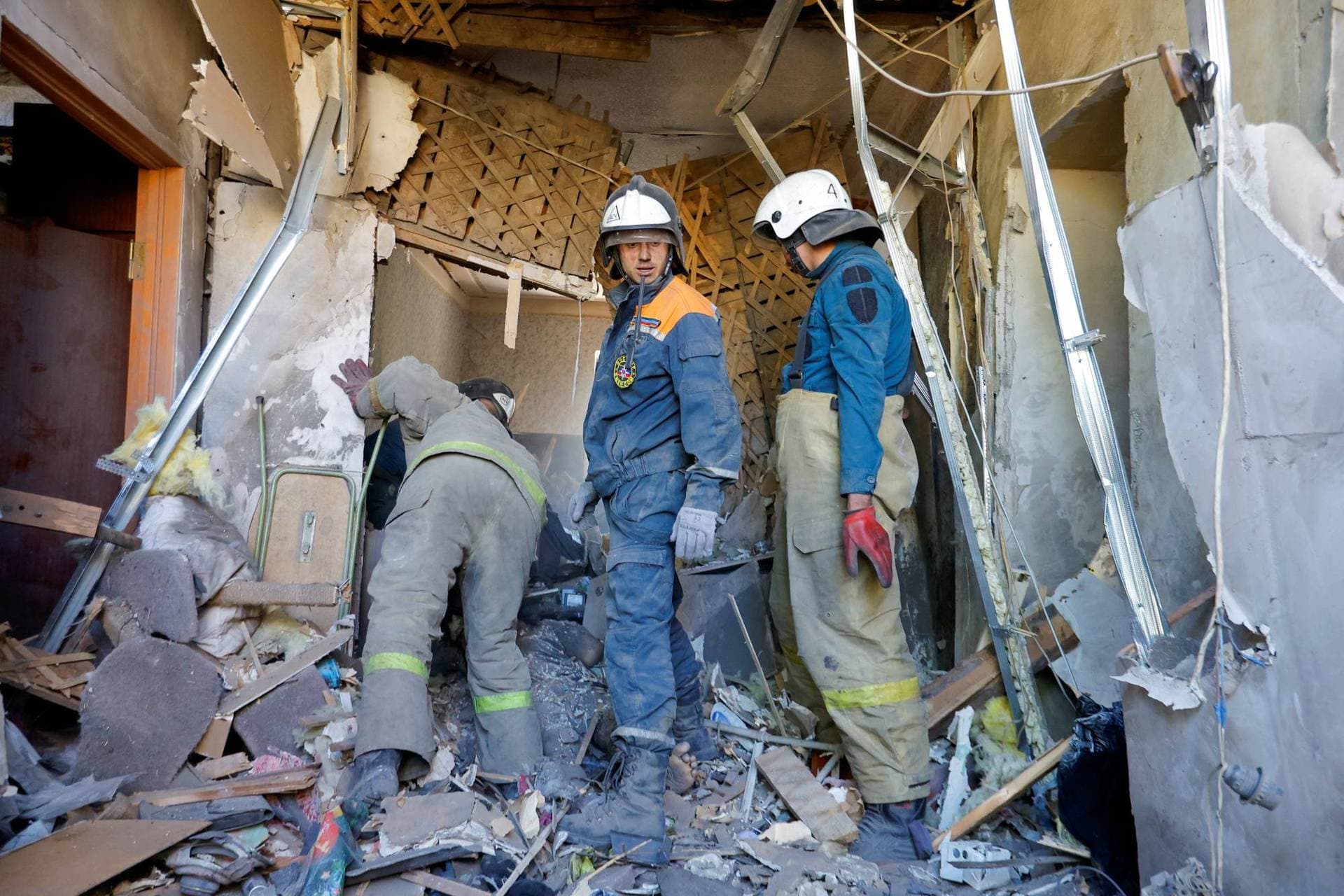 Paramedics at a house that was bombed in a Russian-controlled area of Donetsk region on Wednesday