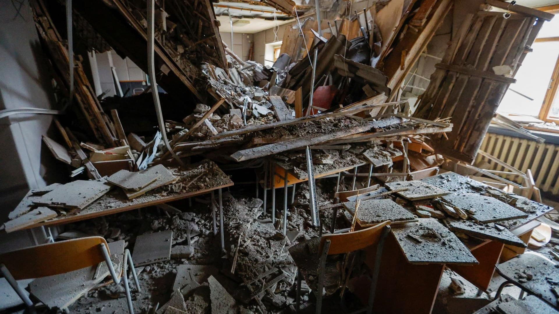Inside a building of a local university of economics and trade that was heavily damaged in recent shelling in Donetsk