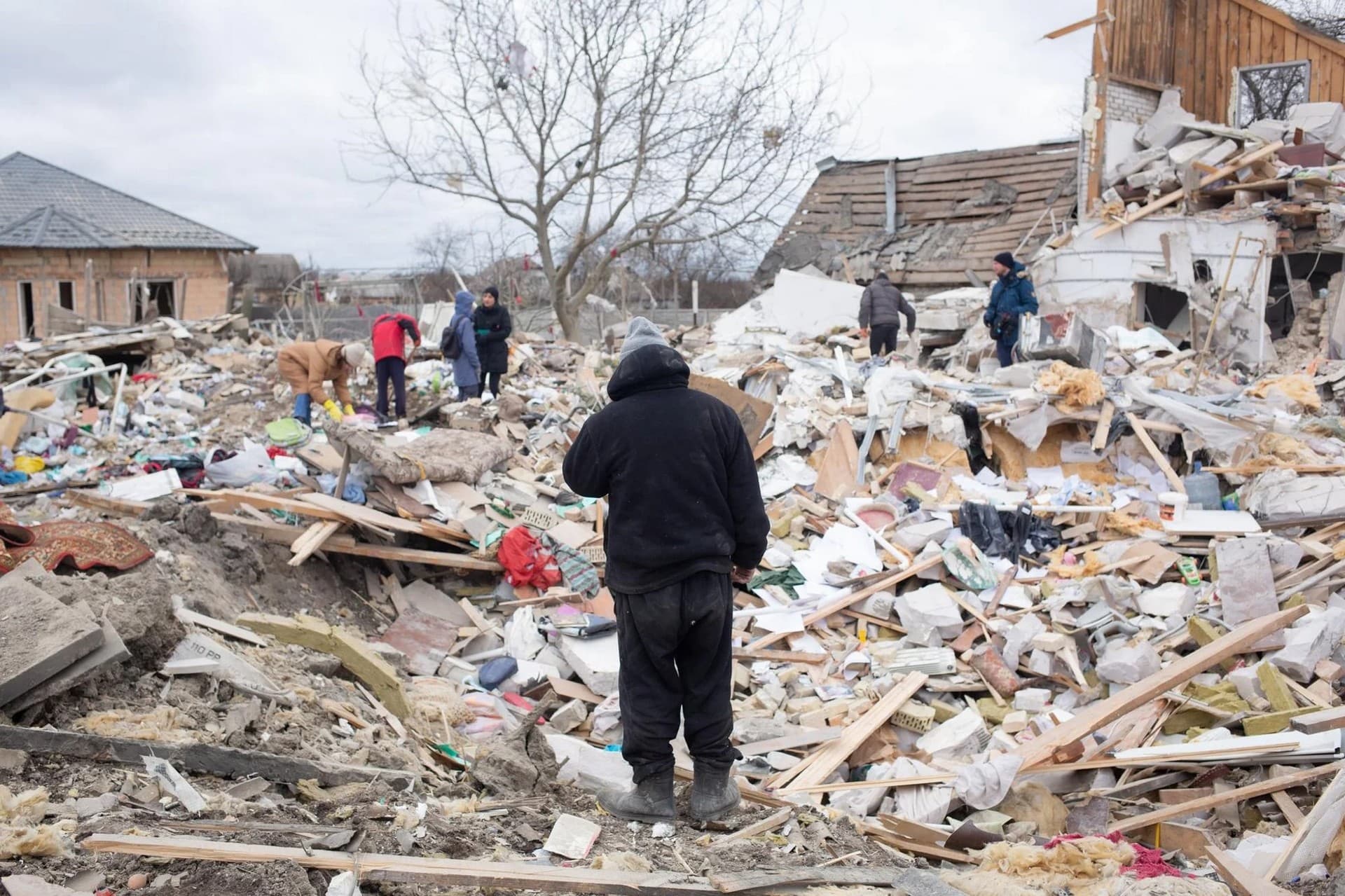 Igor Mazhaev in the ruins of his house in the village of Markhalivka