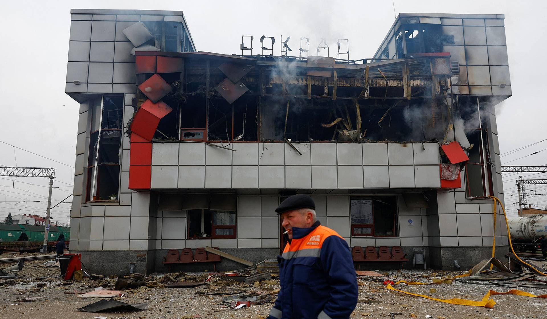 A railway employee walks in front of a railway station building hit during an overnight Russian missile and drone strikes in Fastiv, Kyiv Region, Ukraine, December 6, 2025.