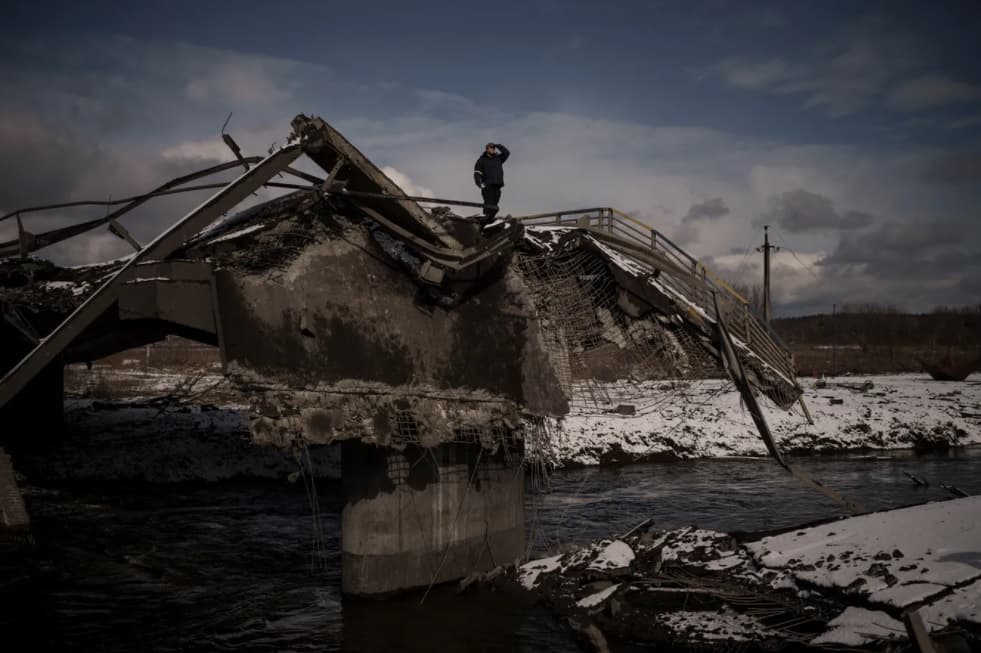 destroyed bridge across the Irpen