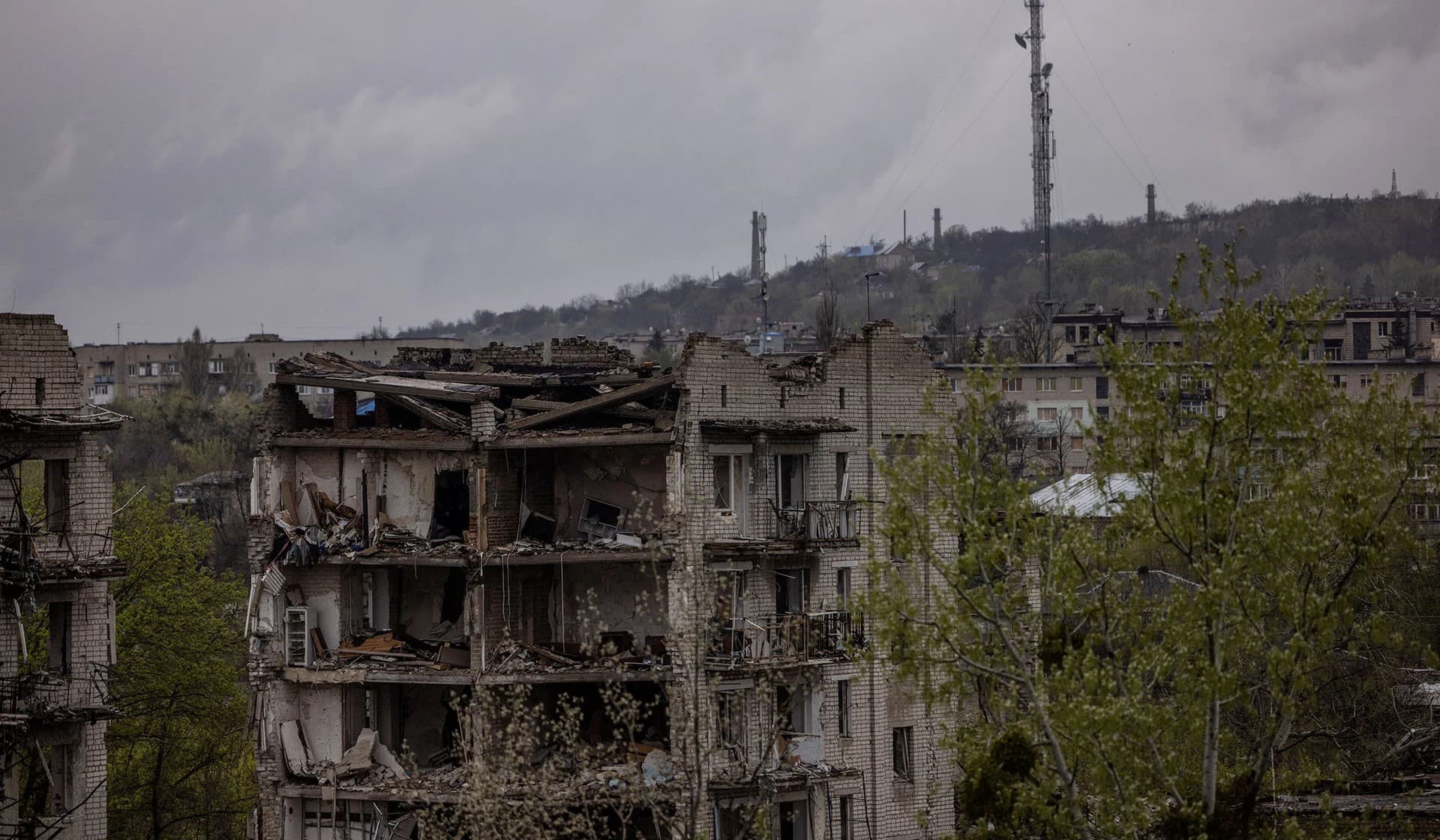 An apartment building destroyed by Russian shelling on the outskirts of Izium