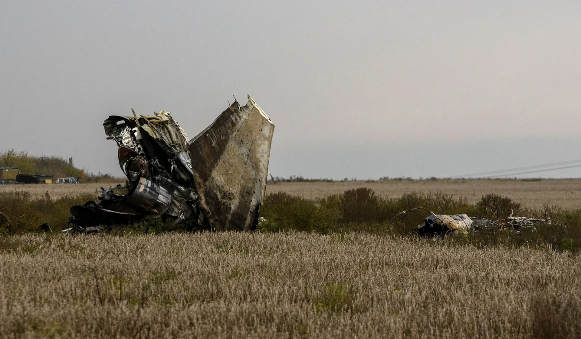 The wreckage of a Russian fighting aircraft shot down by the Ukrainian Armed Forces during a counteroffensive operation in a field near the town of Izium
