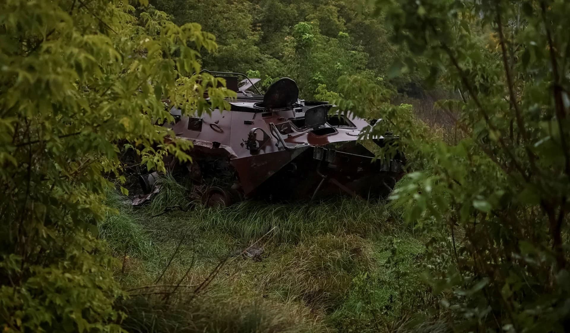 A destroyed Russian amored personnel carrier near the village of Nova Husarivka