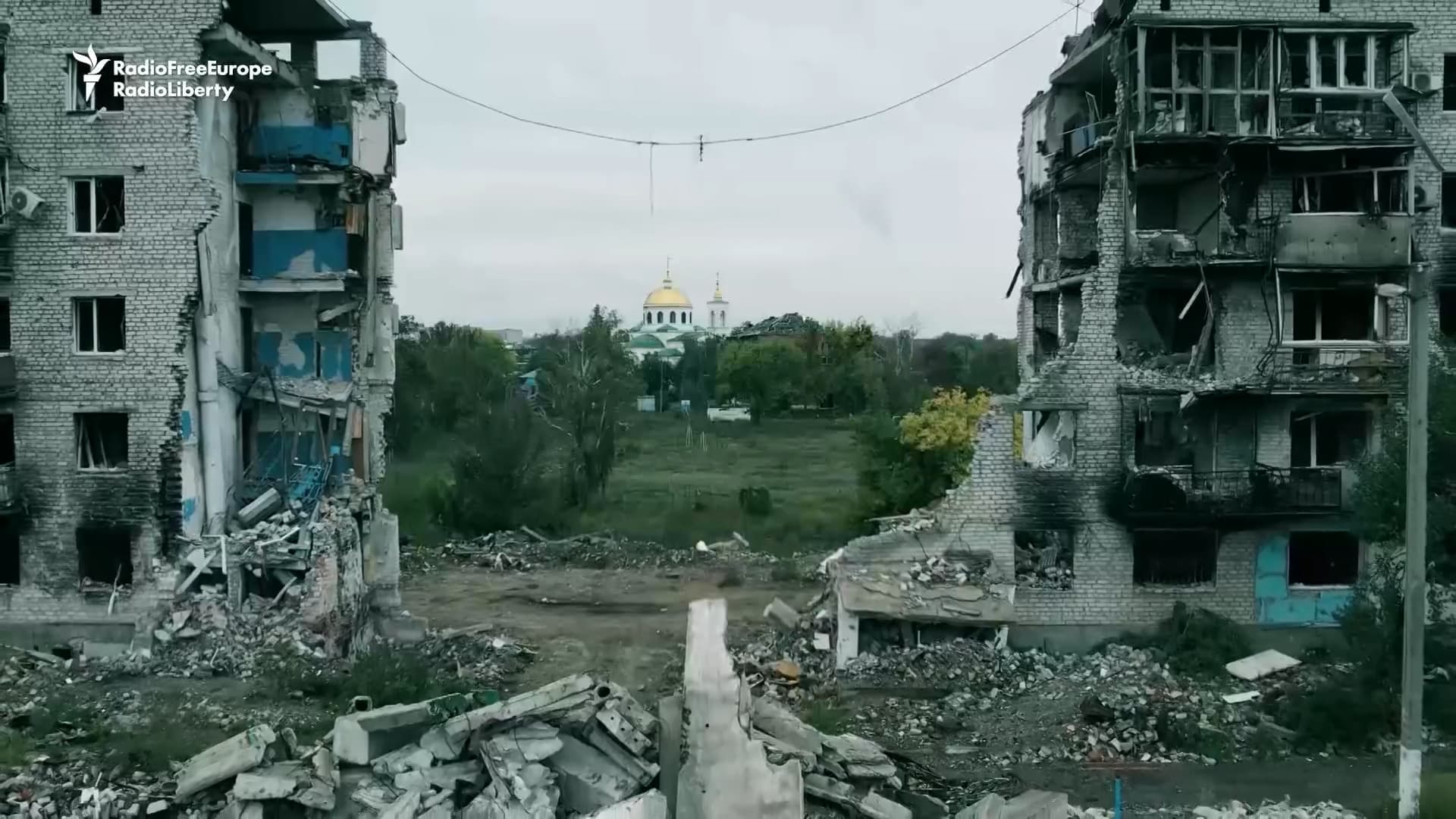 damaged buildings in the Ukrainian town of Izyum