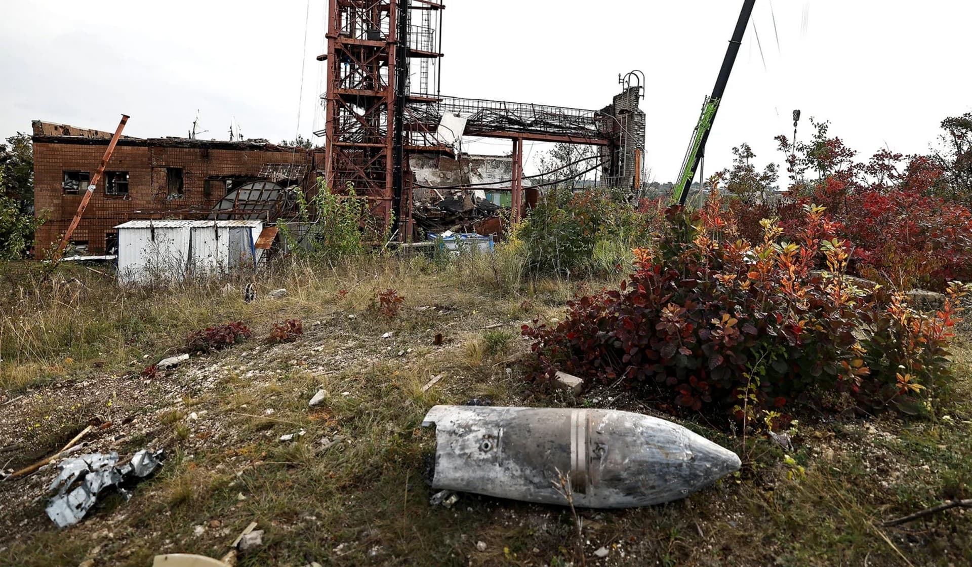 Part of a missile found while firefighters and Ukrainian army soldiers search for bodies of people in the recently liberated town of Izium