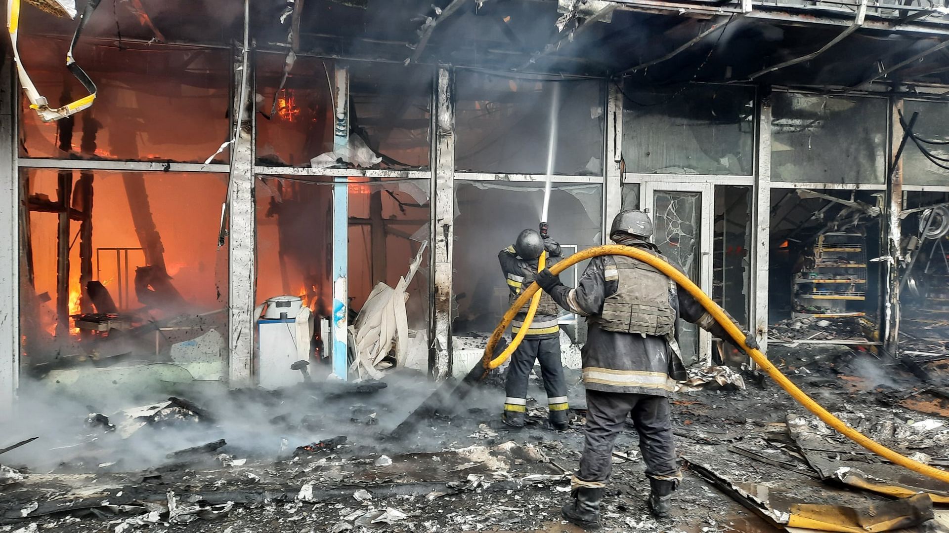 Rescuers extinguish large fire caused by Russian missile in Kharkiv