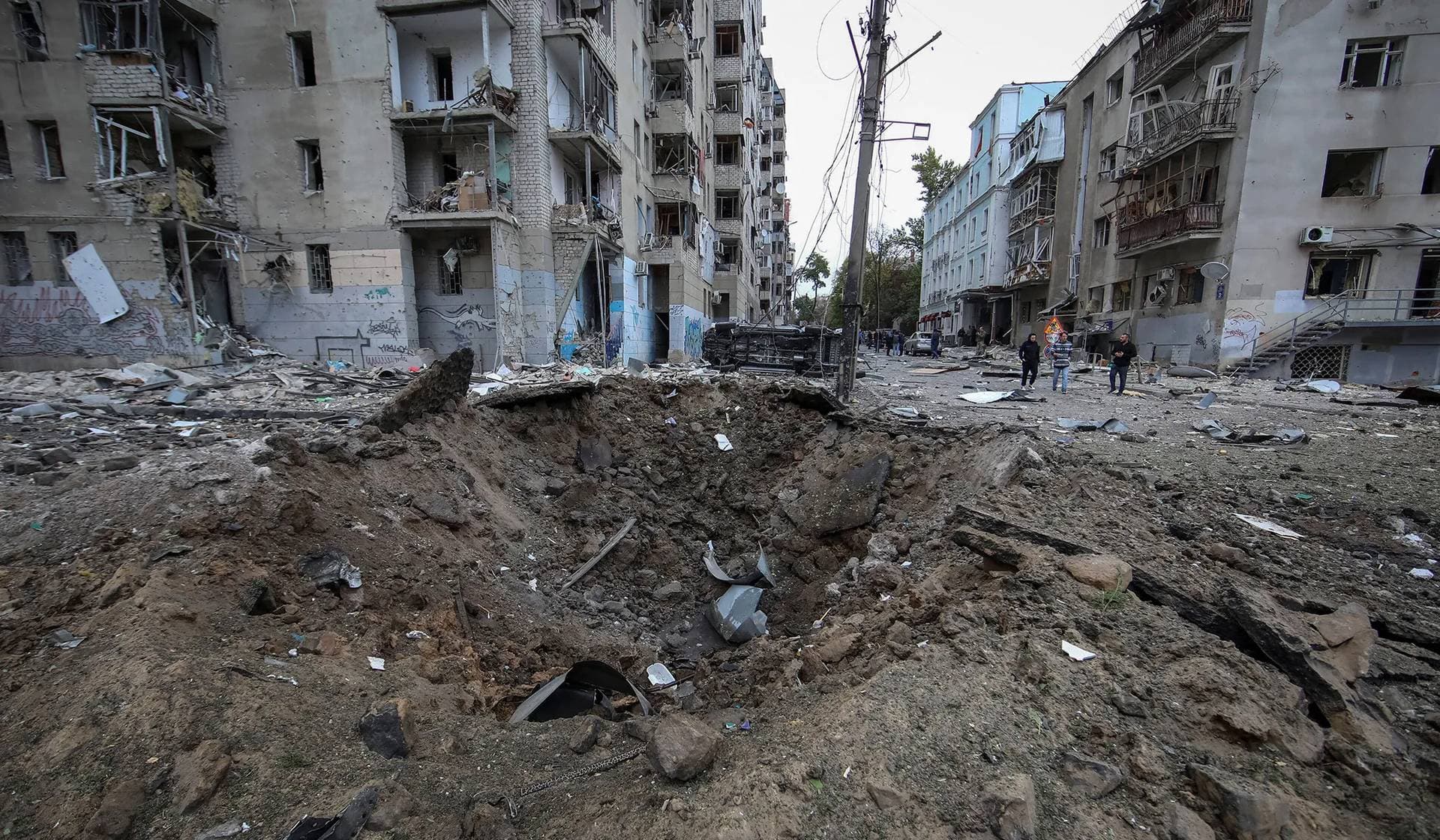 A crater at the site of residential buildings damaged by a Russian missile strike in Kharkiv
