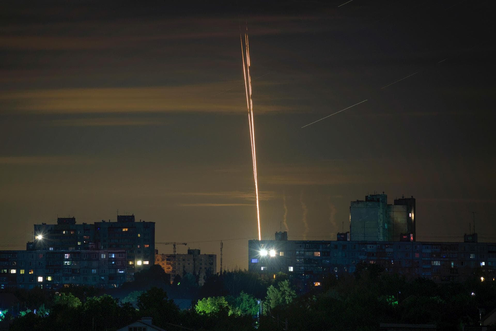 Russian rockets are launched against Ukraine from Russia's Belgorod region, as seen from Kharkiv