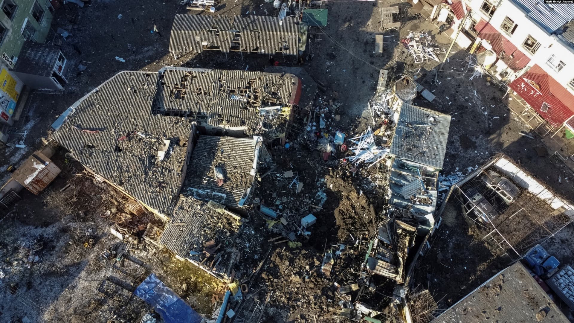 An aerial view shows a local market heavily damaged by a Russian missile strike in the town of Shevchenkove