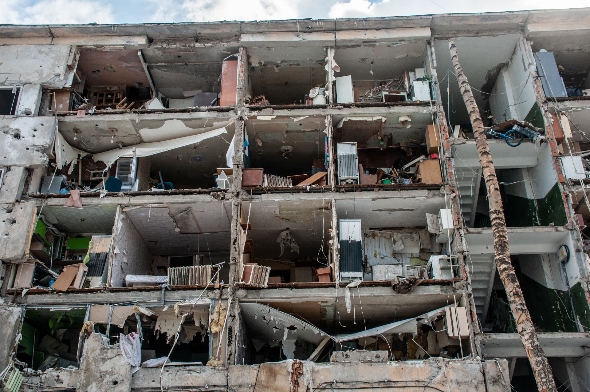 Destroyed residential building, as a result of explosions and shots by the Russian occupying military in Kharkiv