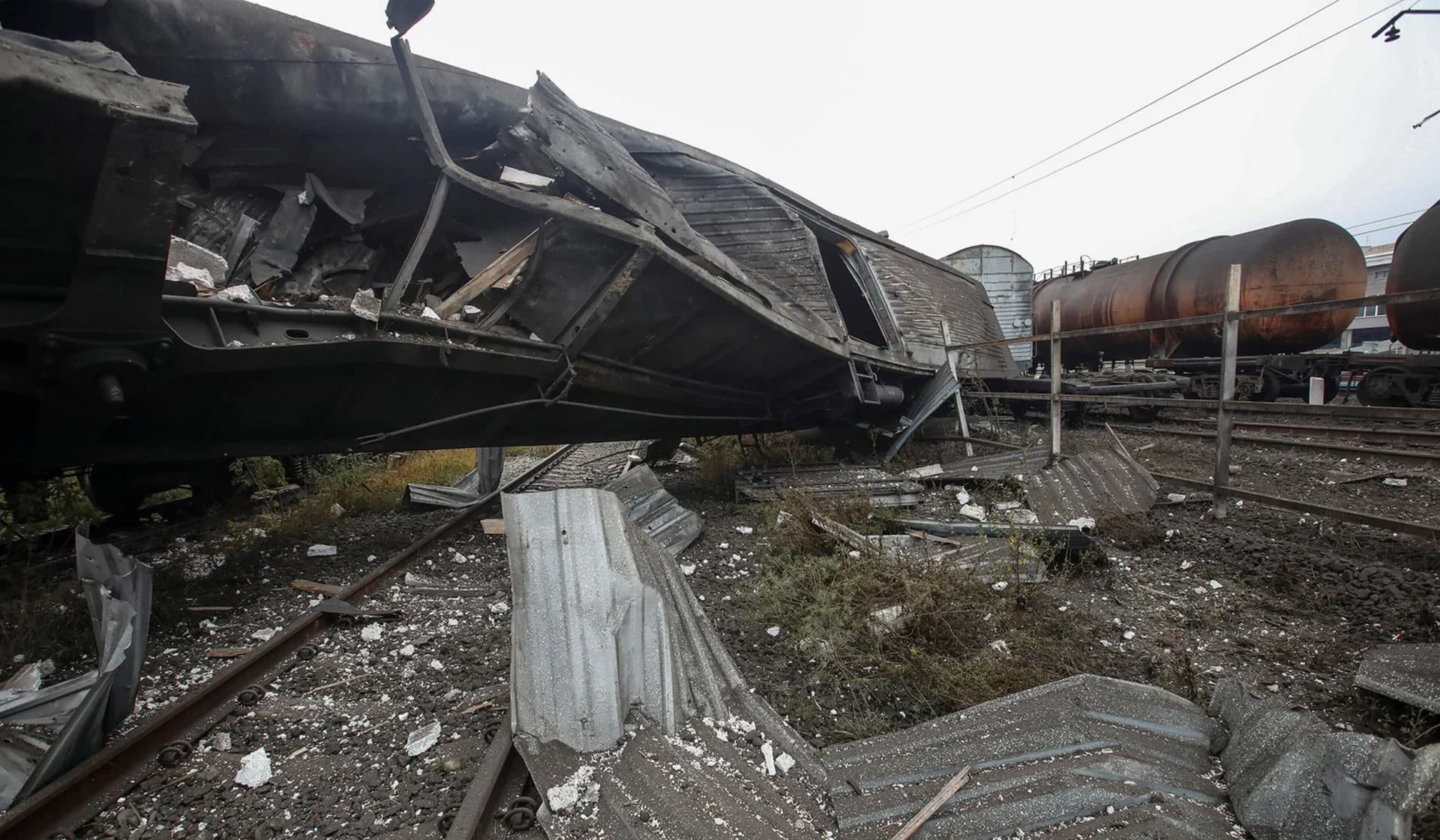 Railway cars destroyed by a Russian missile strike at a cargo terminal in Kharkiv