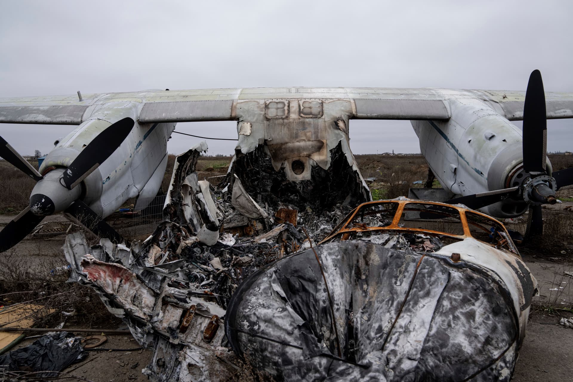 An aircraft that was destroyed during fighting between Ukrainian and Russian forces is seen at the Kherson international airport in Kherson