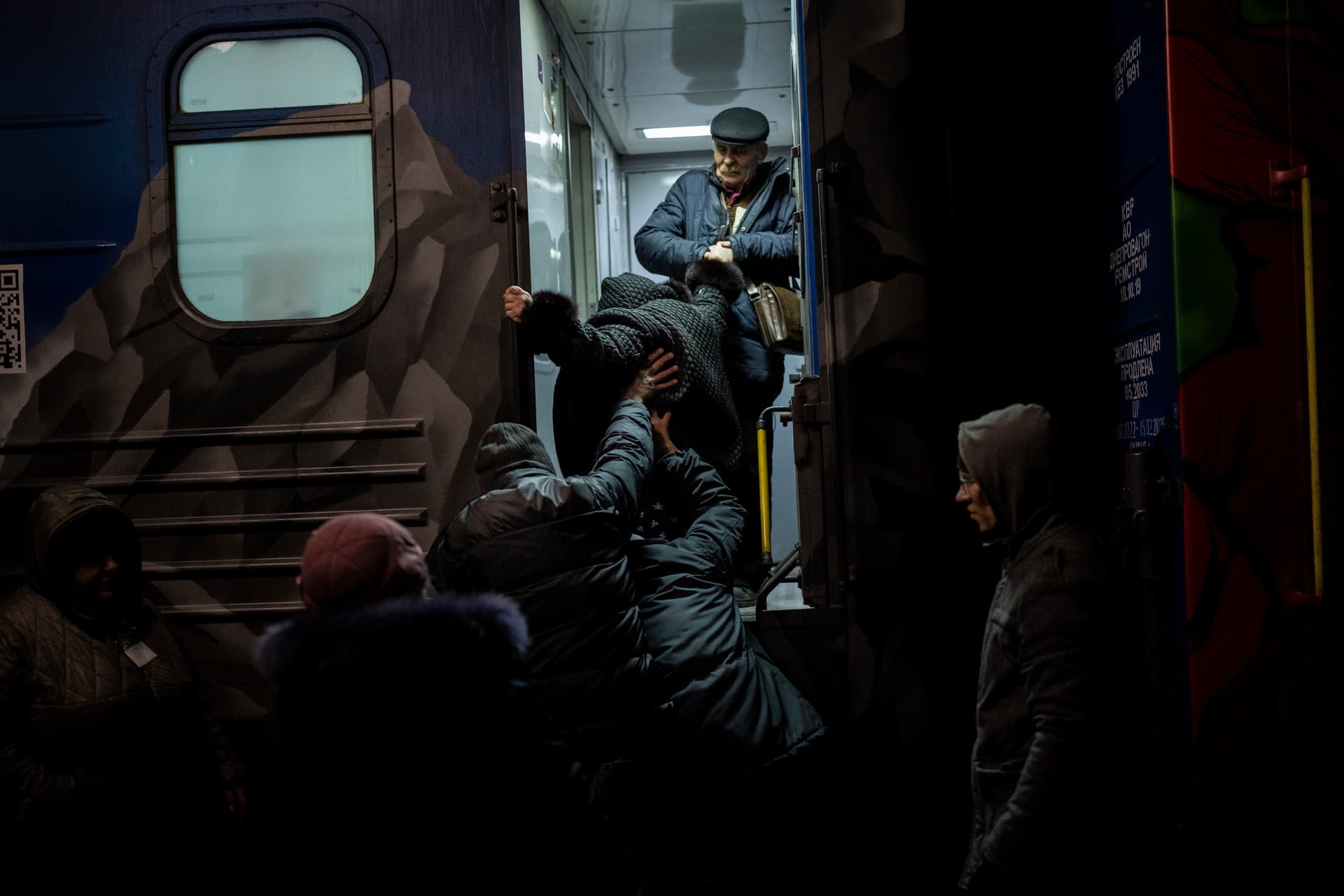 Ukrainians board the Kherson-Kyiv train at the Kherson railway station