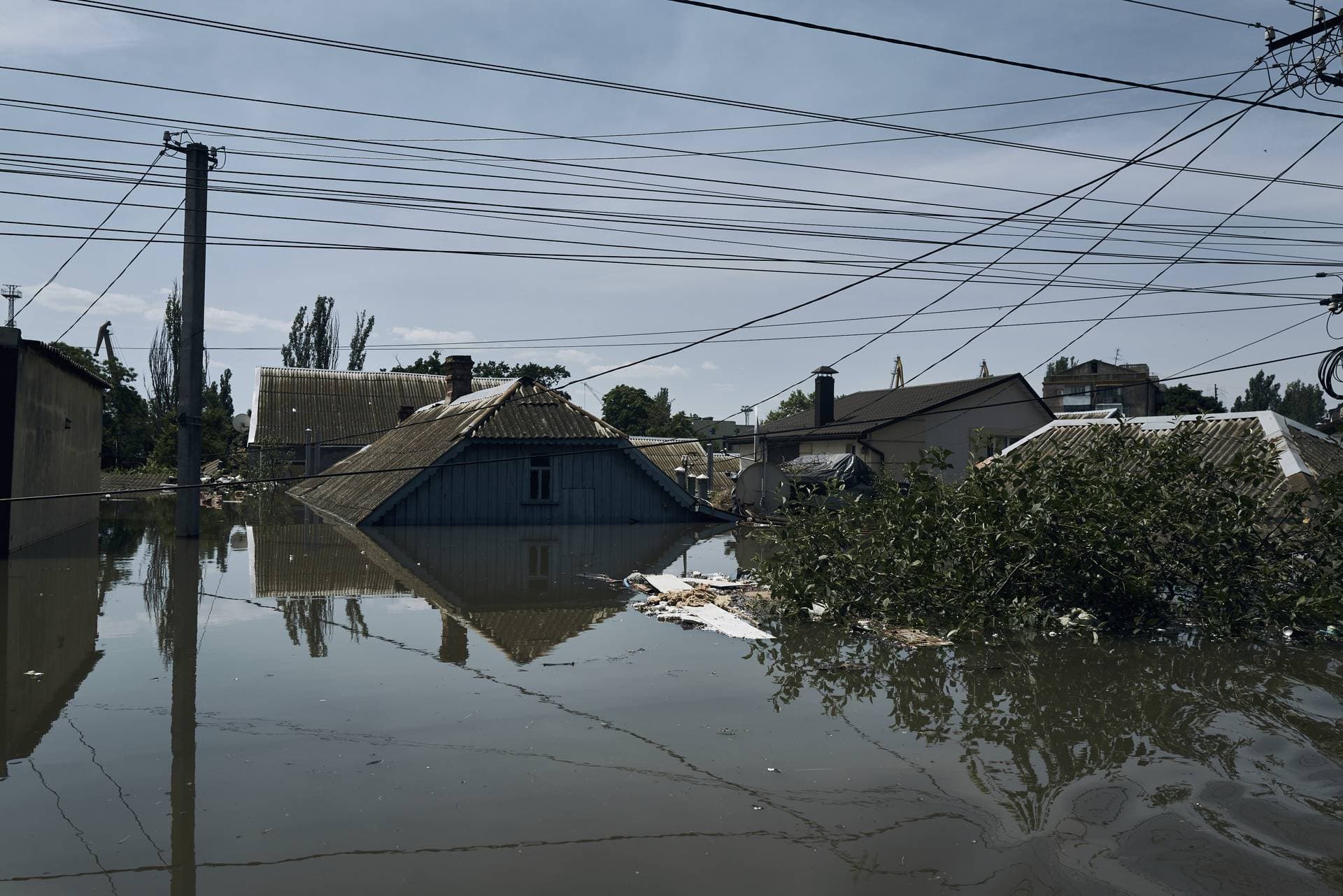 A view of the roofs of flooded private houses in Kherson