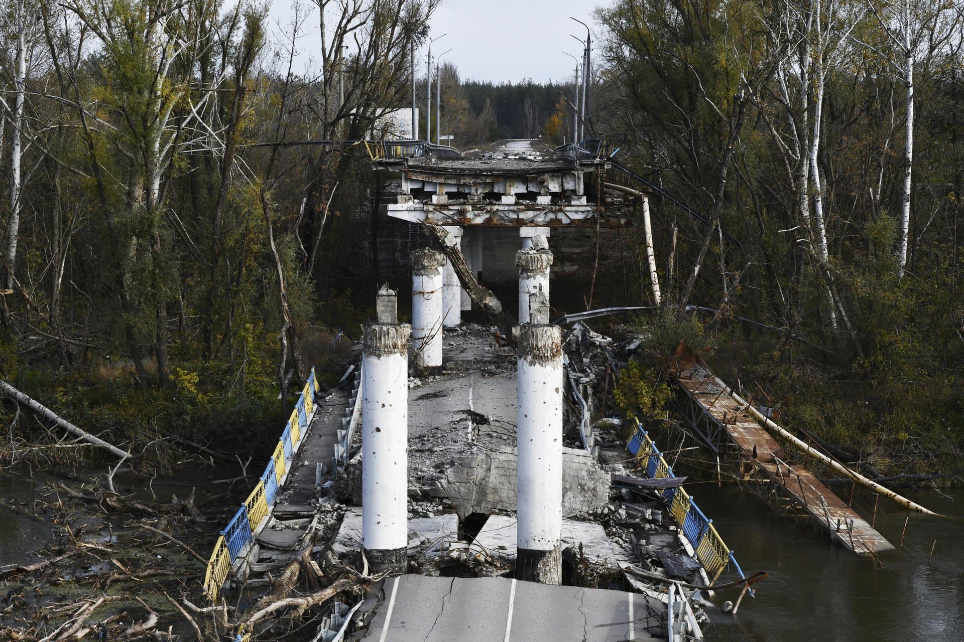 A view of a damaged bridge in the retaken village of Bohorodychne