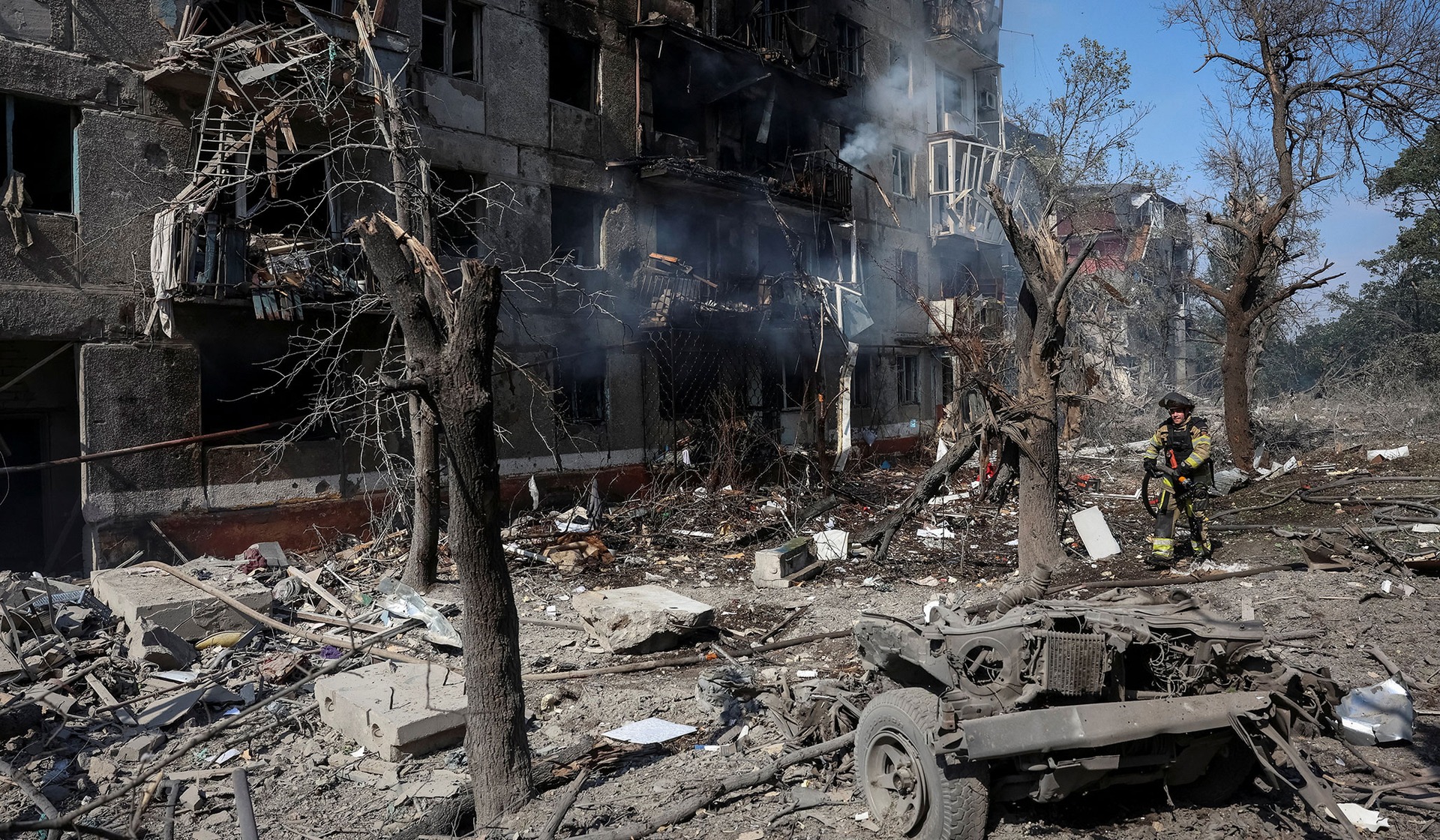 A rescuer works at a site of an apartment building damaged during a Russian air strike in the frontline city of Kramatorsk