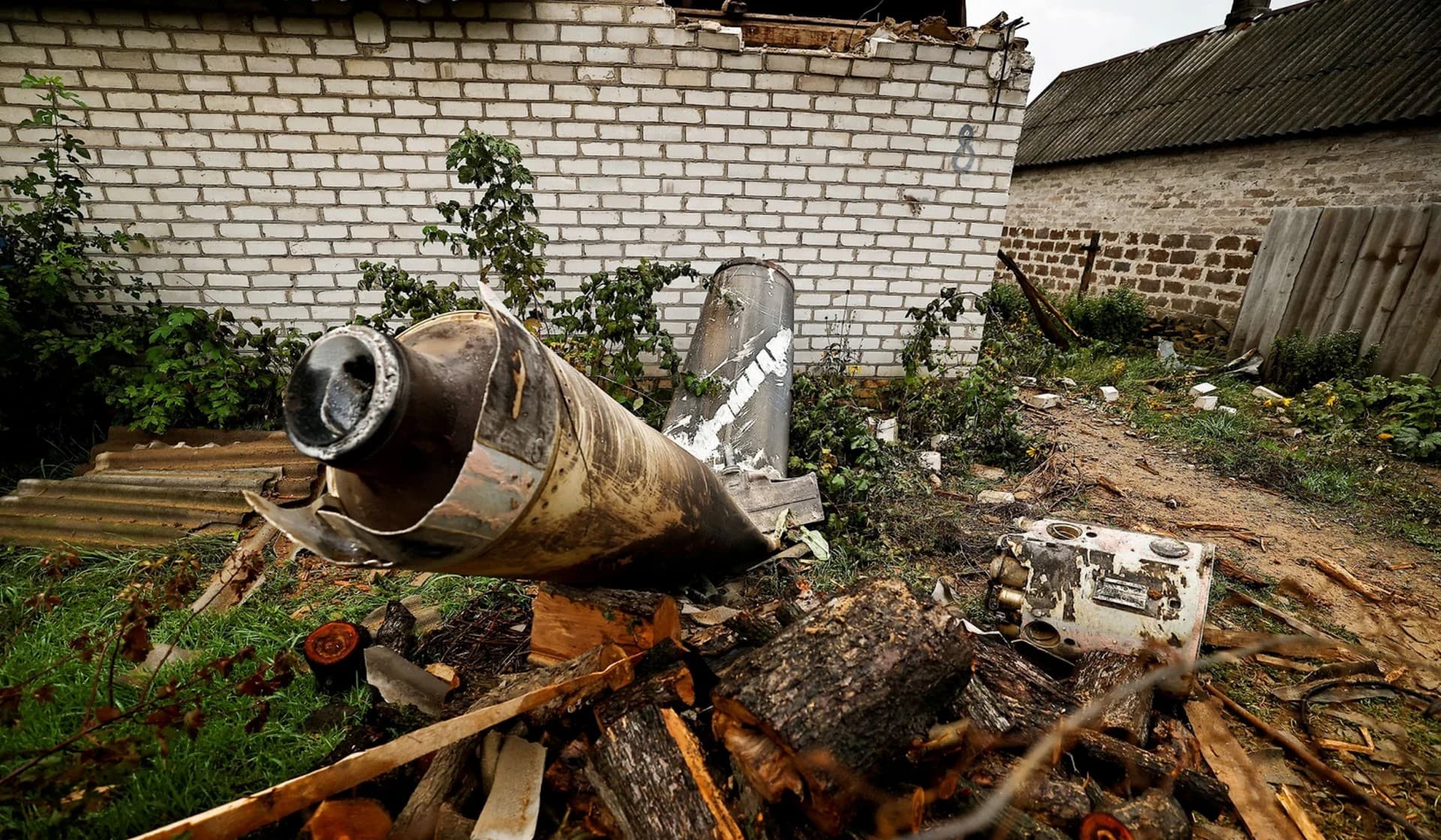 A Russian missile lying at the garden of a house following an early morning missile strike in Kramatorsk