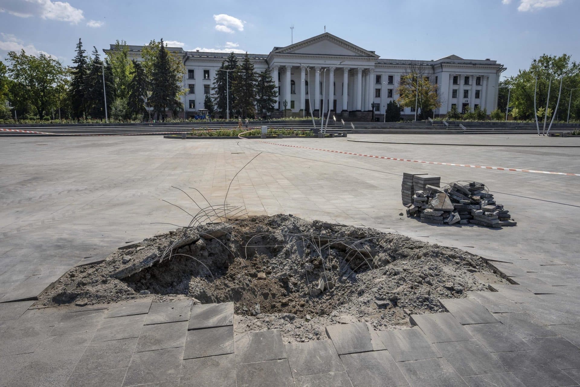 A crater in the aftermath of a Russian missile strike, in front of the city council hall building, in Kramatorsk city hall