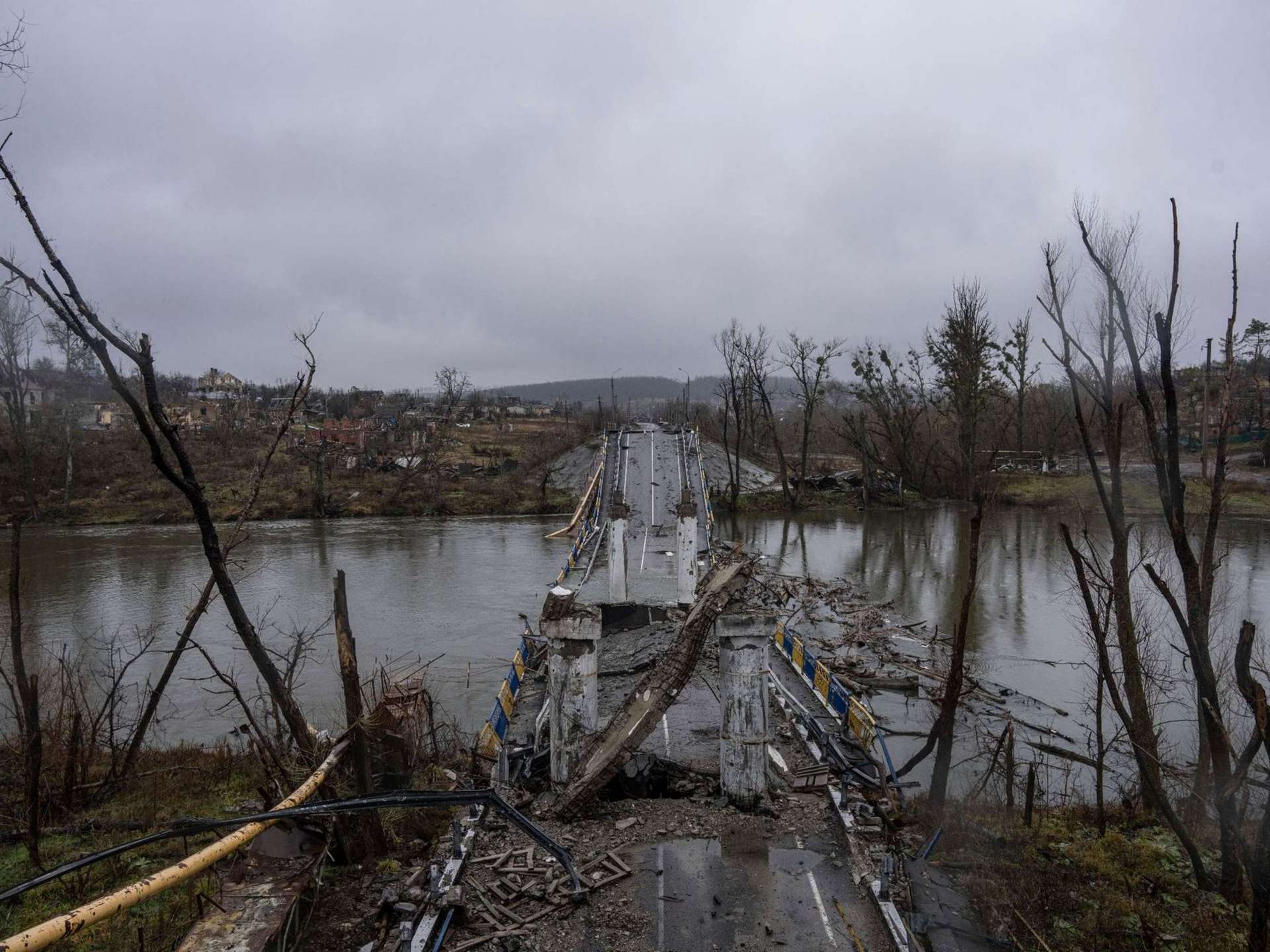 A destroyed bridge across Siverskyi-Donets river is seen in the village of Bogorodychne