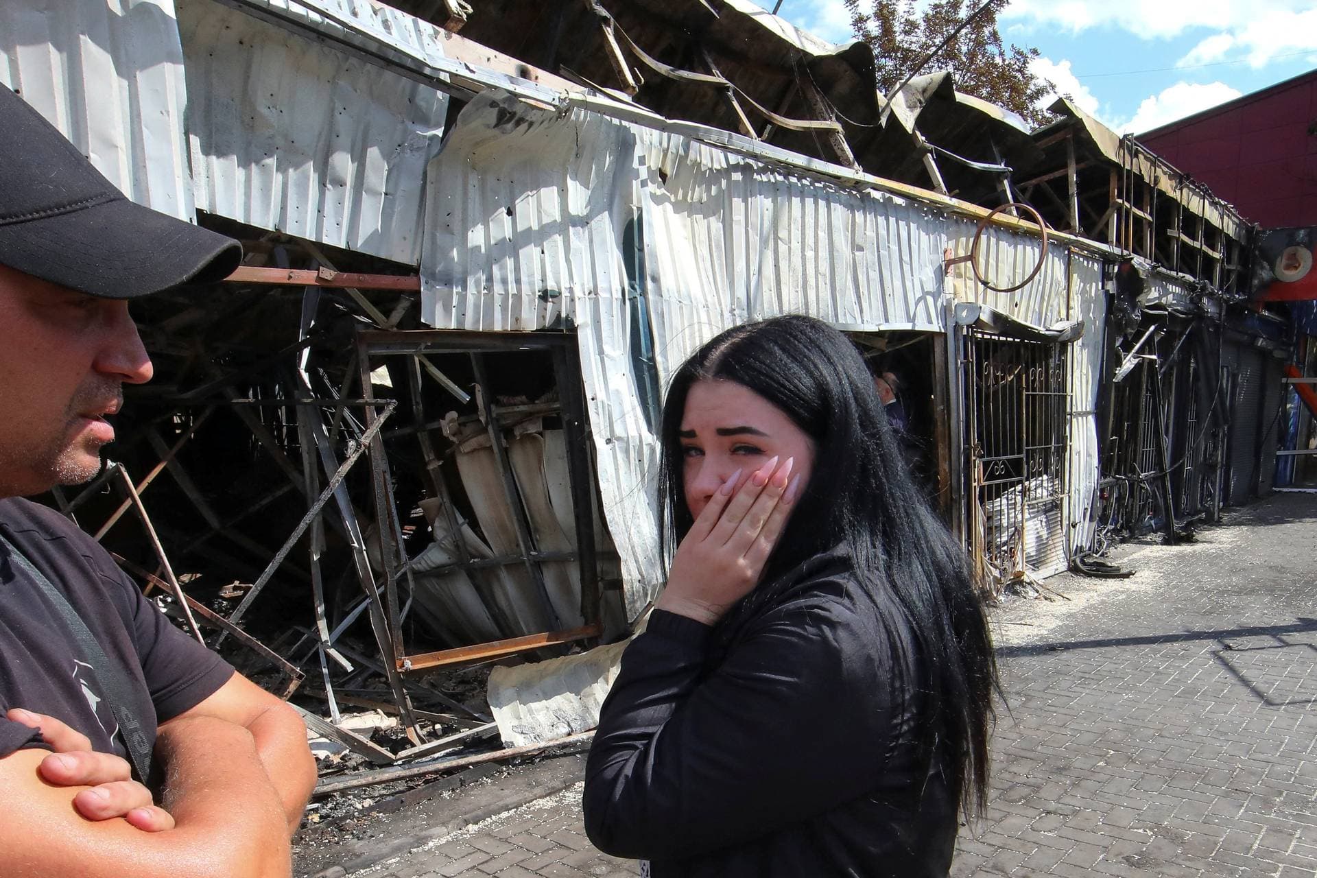 A local woman reacts at the site of yesterday's Russian military strike, amid Russia's attack on Ukraine, in Kostiantynivka