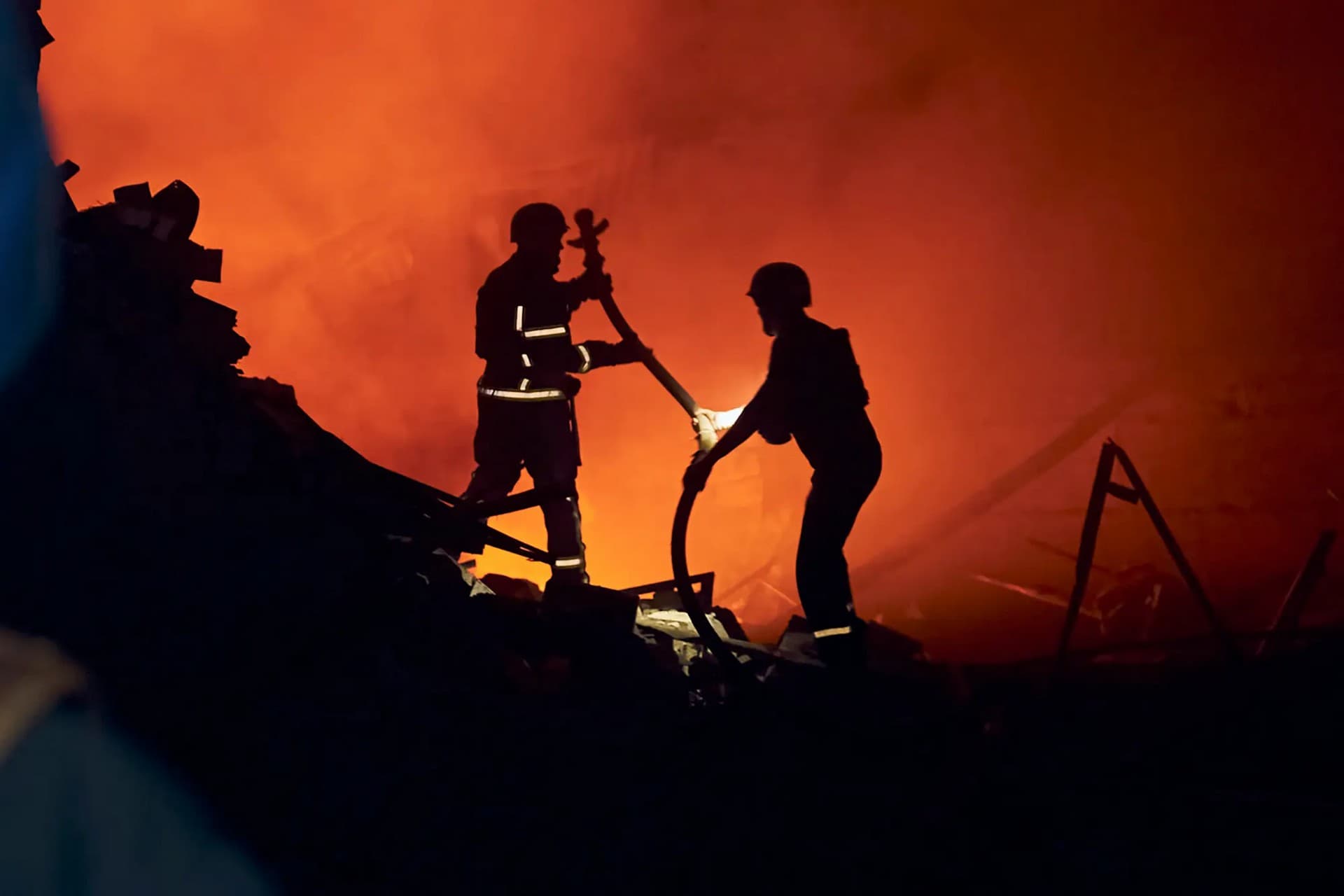 Ukrainian State Emergency Service firefighters work after a rocket attack in Kramatorsk