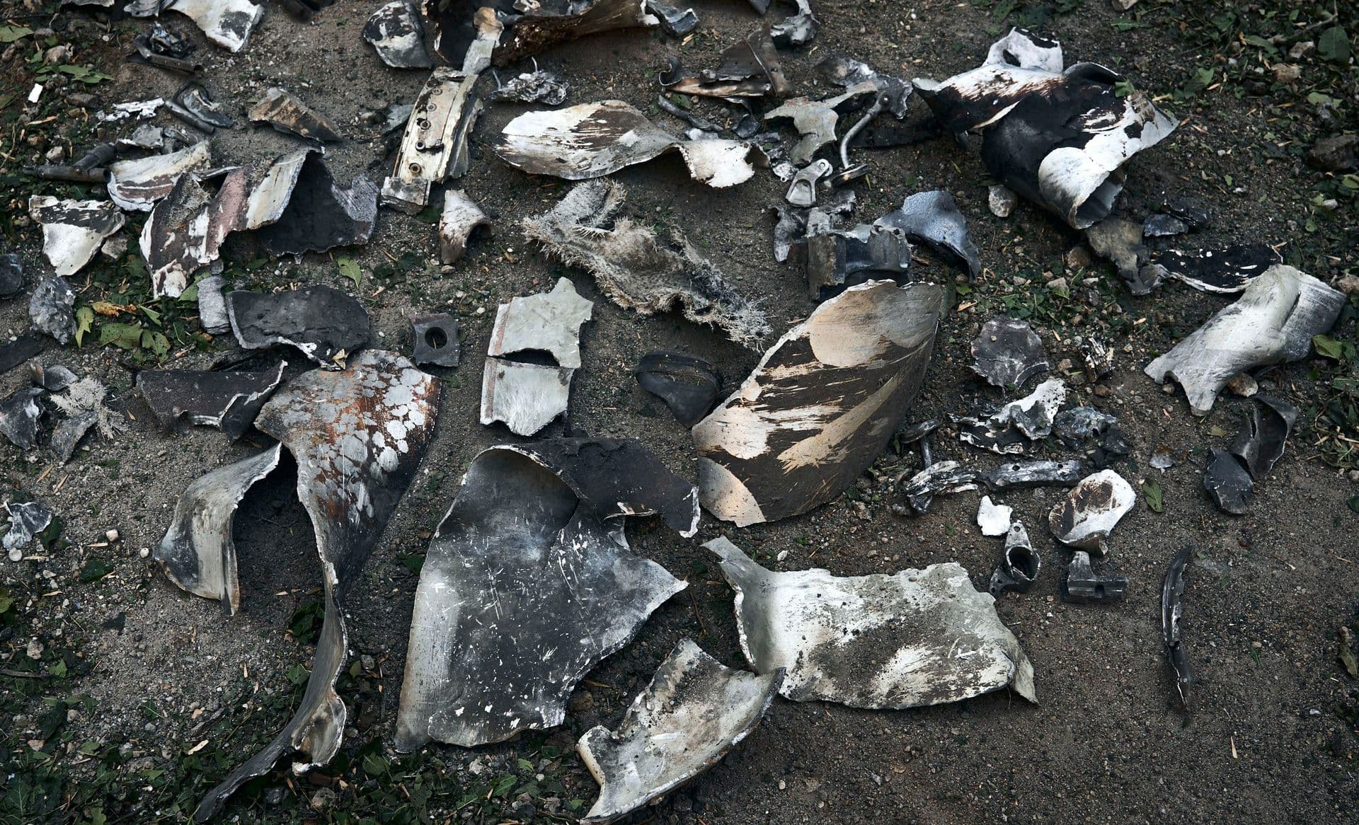 Fragments of ammunition placed on the ground by Ukrainian police investigators after a rocket attack in Kramatorsk