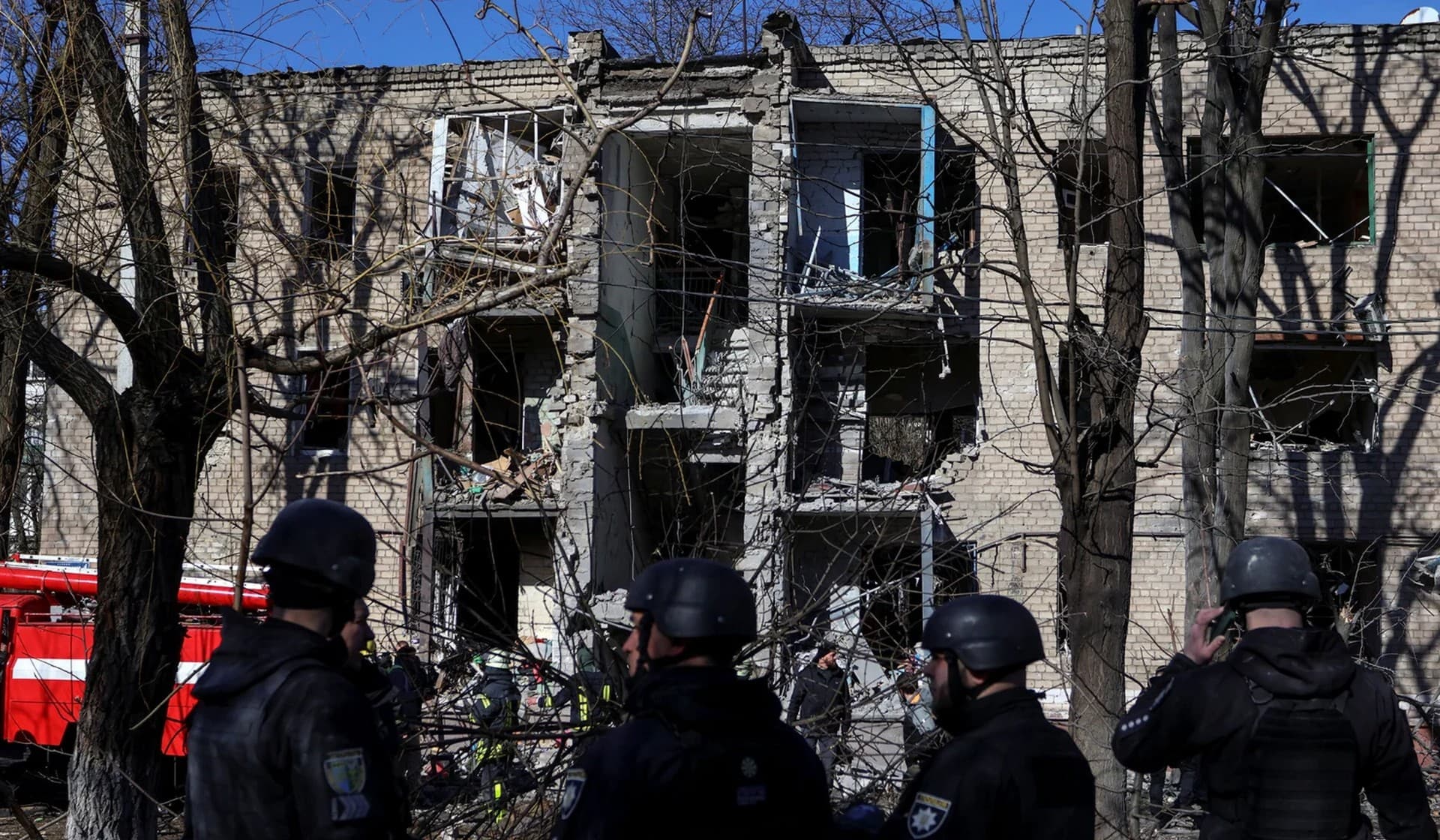 Rescuers work at a site of a residential building damaged by a Russian missile strike in Kramatorsk