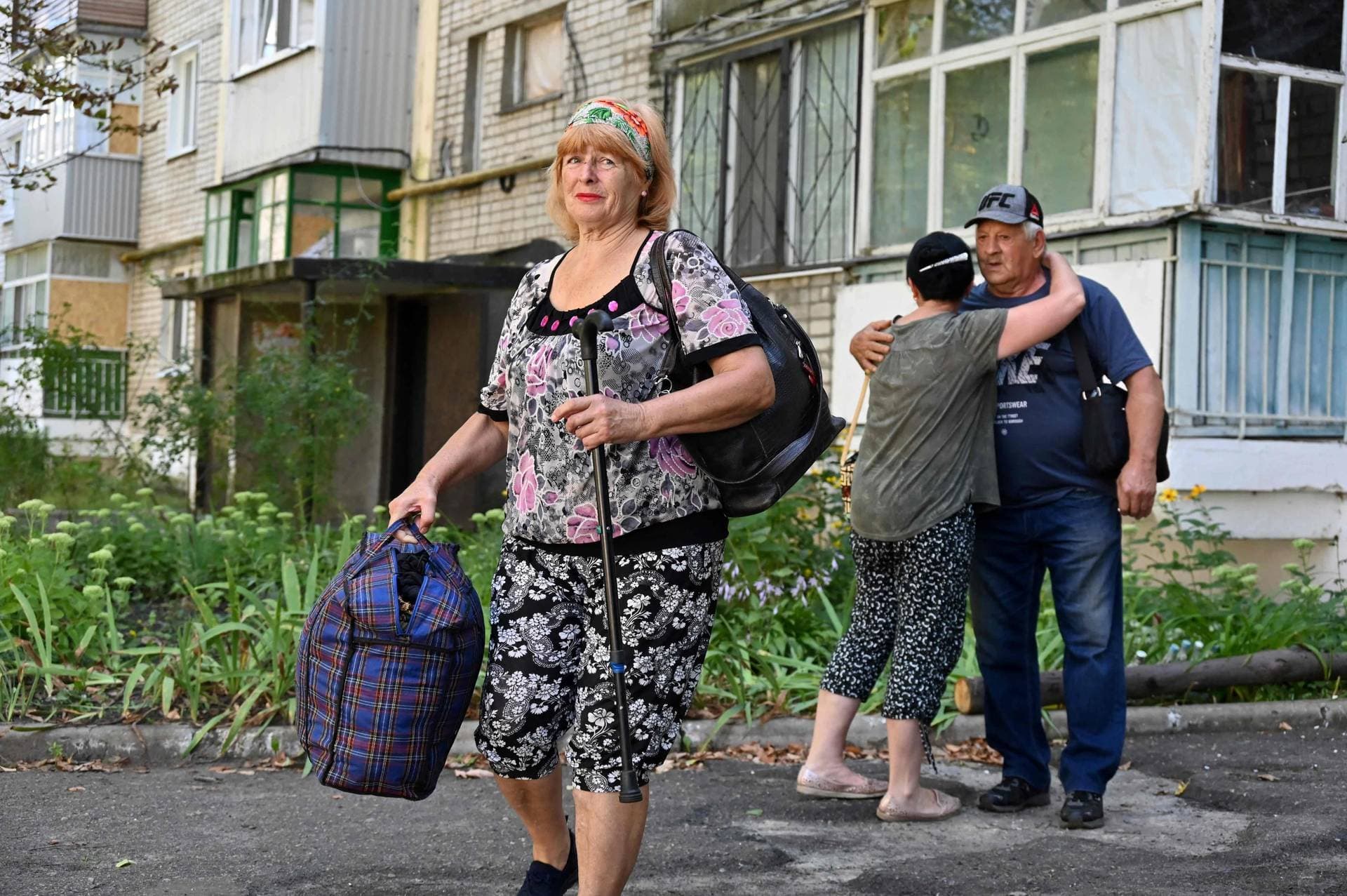 Local residents evacuate from a village near Kupiansk